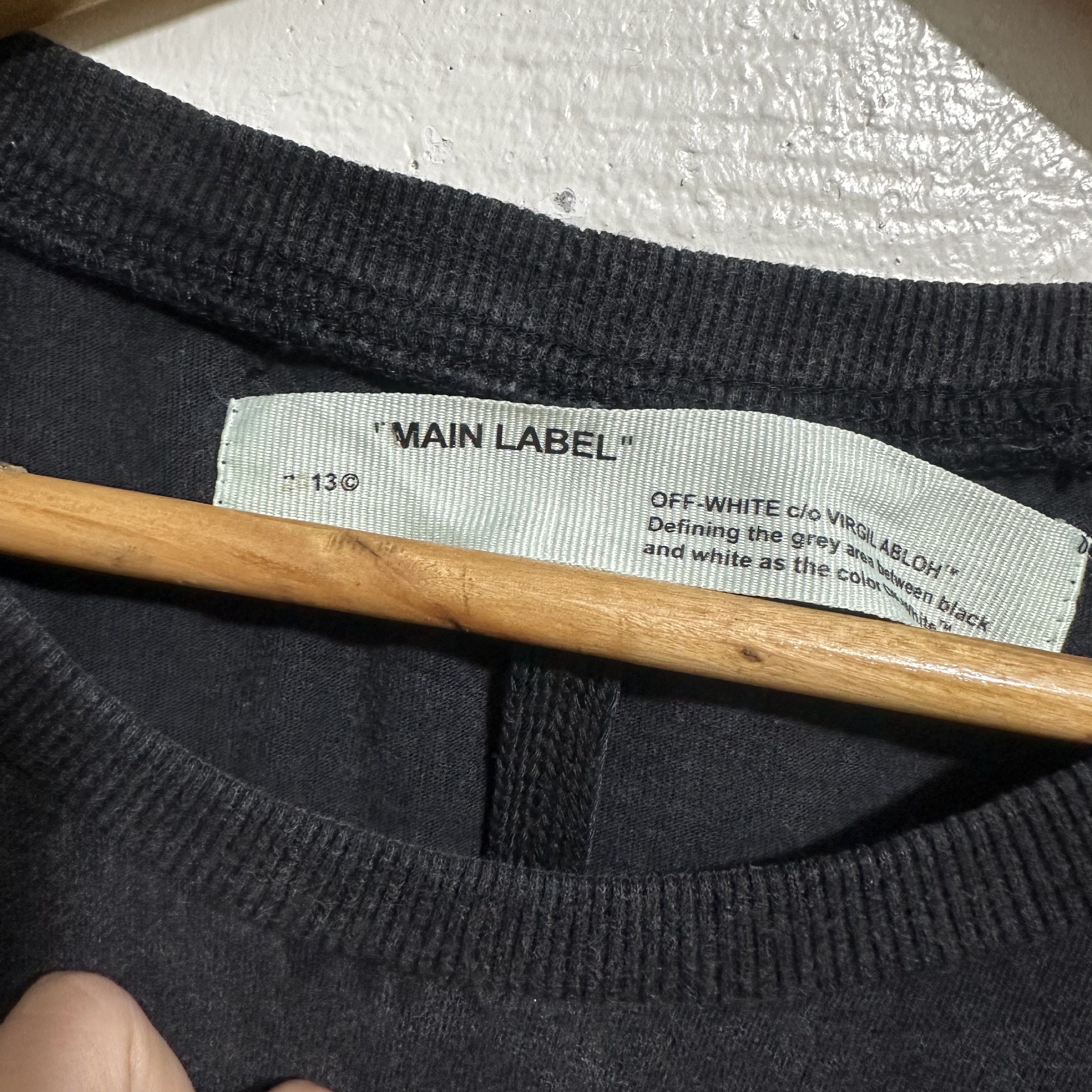 Off-White c/o Virgil Abloh T-shirt (Category: Tshirts & Polo Shirts ) located in Angeles City. Submitted by eemps (Listing ID 1419702192, Image 3). Description: -Includes the original hangtag. - acid wash (Black) -Size XL-XXL (Women).
