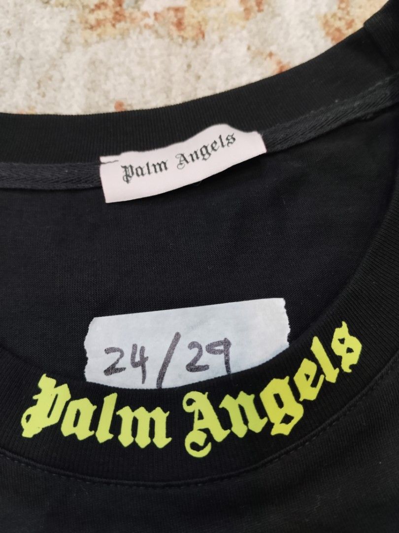 Palm Angels Black T-shirt XL (Category: Tshirts & Polo Shirts) located in Kajang. Submitted by kbros_bundle (Listing ID 1419624637, Image 3). Description: - Palm Angels T-shirt - Condition like new - Size: XL Pit 24 Length 29 - Neon green logo on front and back - Material: Polyester - Includes washing instructions on tag - Perfect for everyday wear .