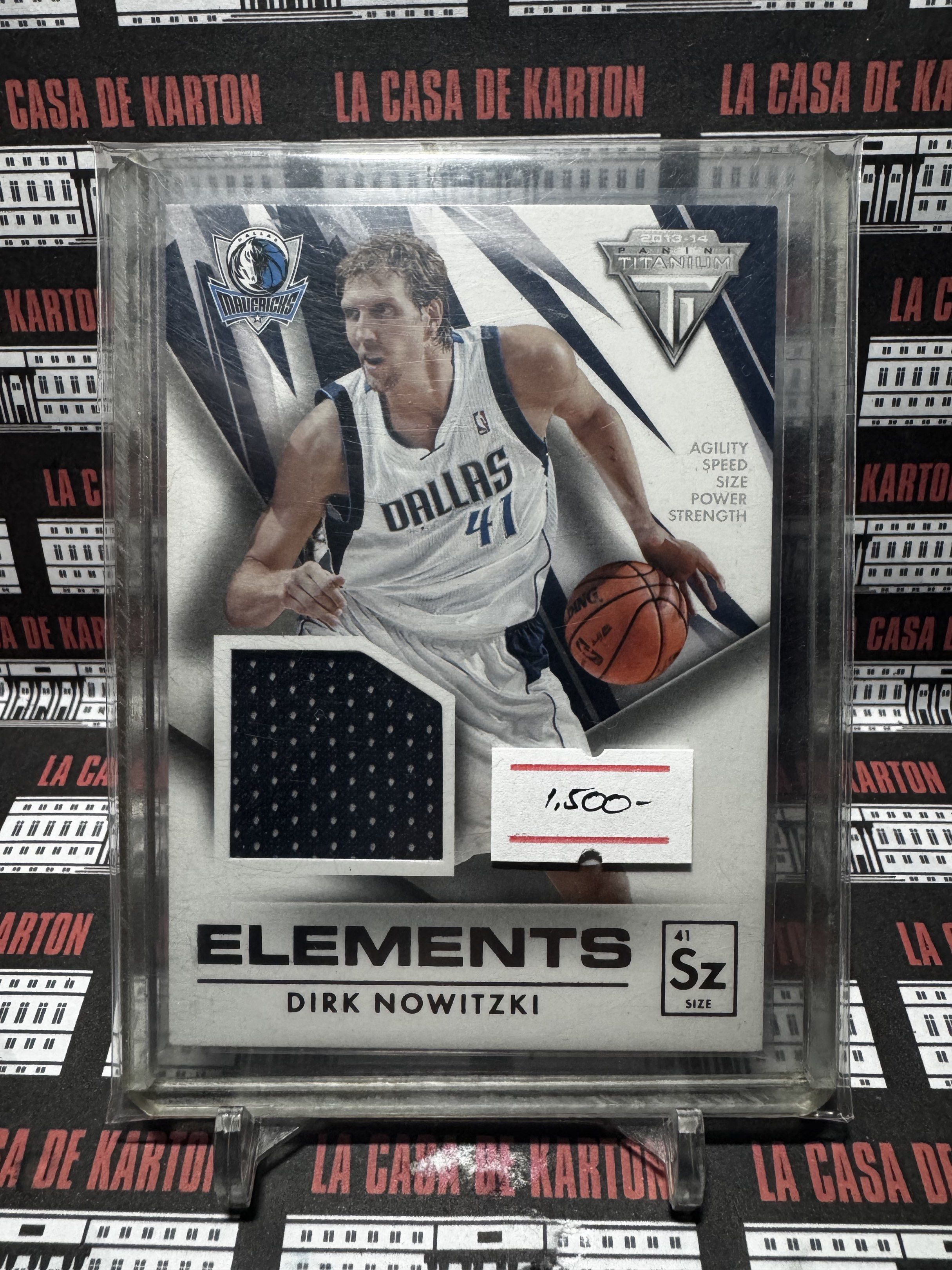 Panini Elements Dirk Nowitzki Jersey Card (Category: Raw Singles) located in Pateros City. Submitted by lacasadekartonph (Listing ID 1419640682, Image 1). Description: - Panini Elements trading card featuring Dirk Nowitzki - Includes a jersey swatch - Comes in a protective holder - Showcases the Dallas Mavericks logo - Features the number 41 - Sz 41.