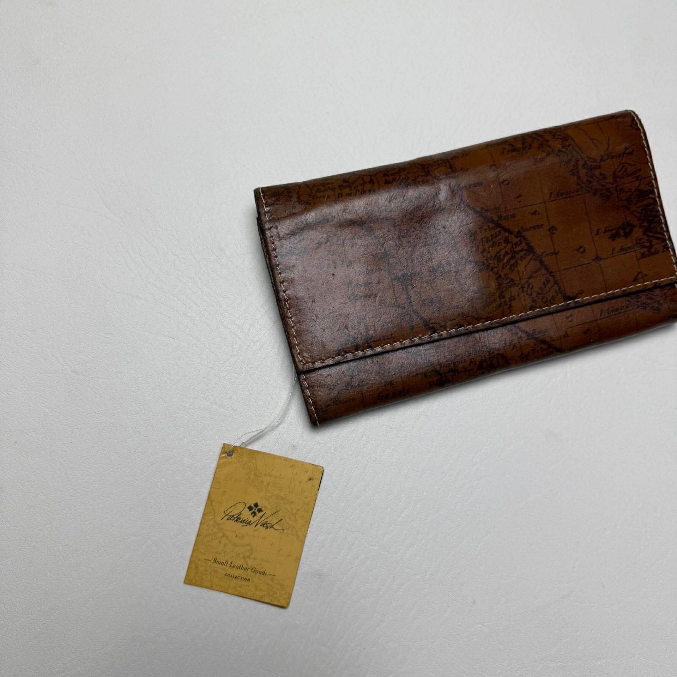 PATRICIA NASH MAP PRINT WALLET (Category: Luxury Bags & Wallets) located in Guagua. Submitted by sweetboyy (Listing ID 1419678376, Image 3). Description: PATRICIA NASH MAP PRINT WALLET.