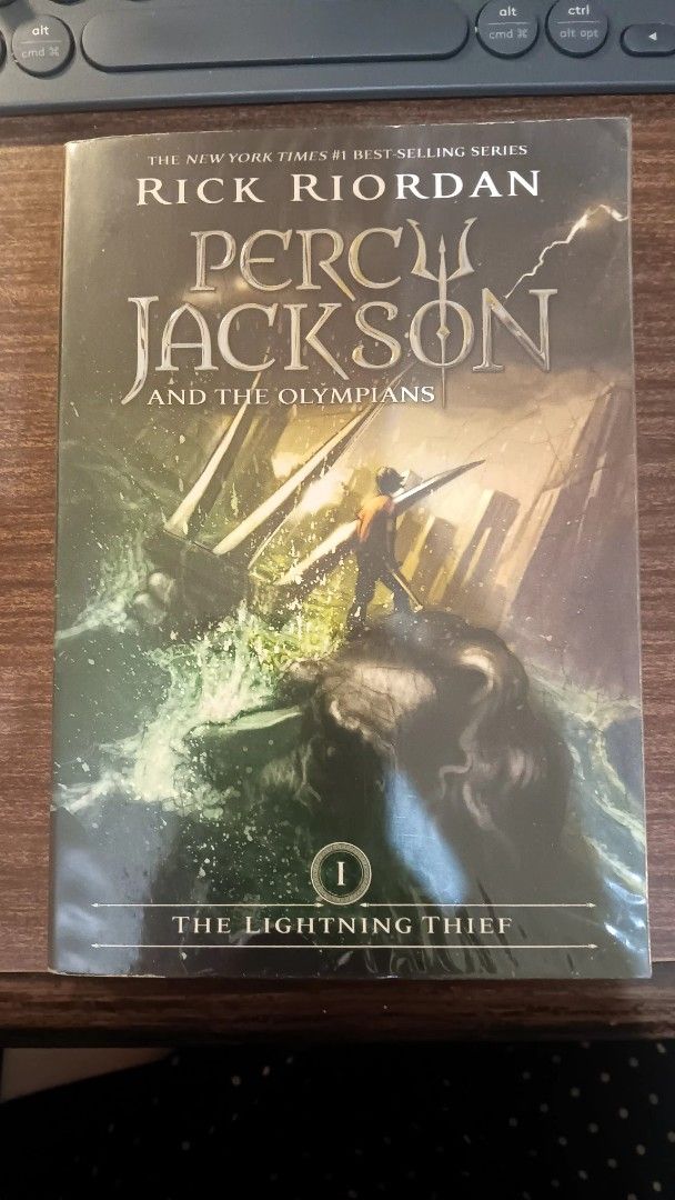 Percy Jackson and the Olympians: The Lightning Thief (Category: Storybooks) located in Manila. Submitted by bes034 (Listing ID 1419769251, Image 1). Description: - 'The Lightning Thief' by Rick Riordan - First book in the Percy Jackson series - Brand new, in original packaging - Includes story summary on the back - Published by Disney Hyperion, New York.
