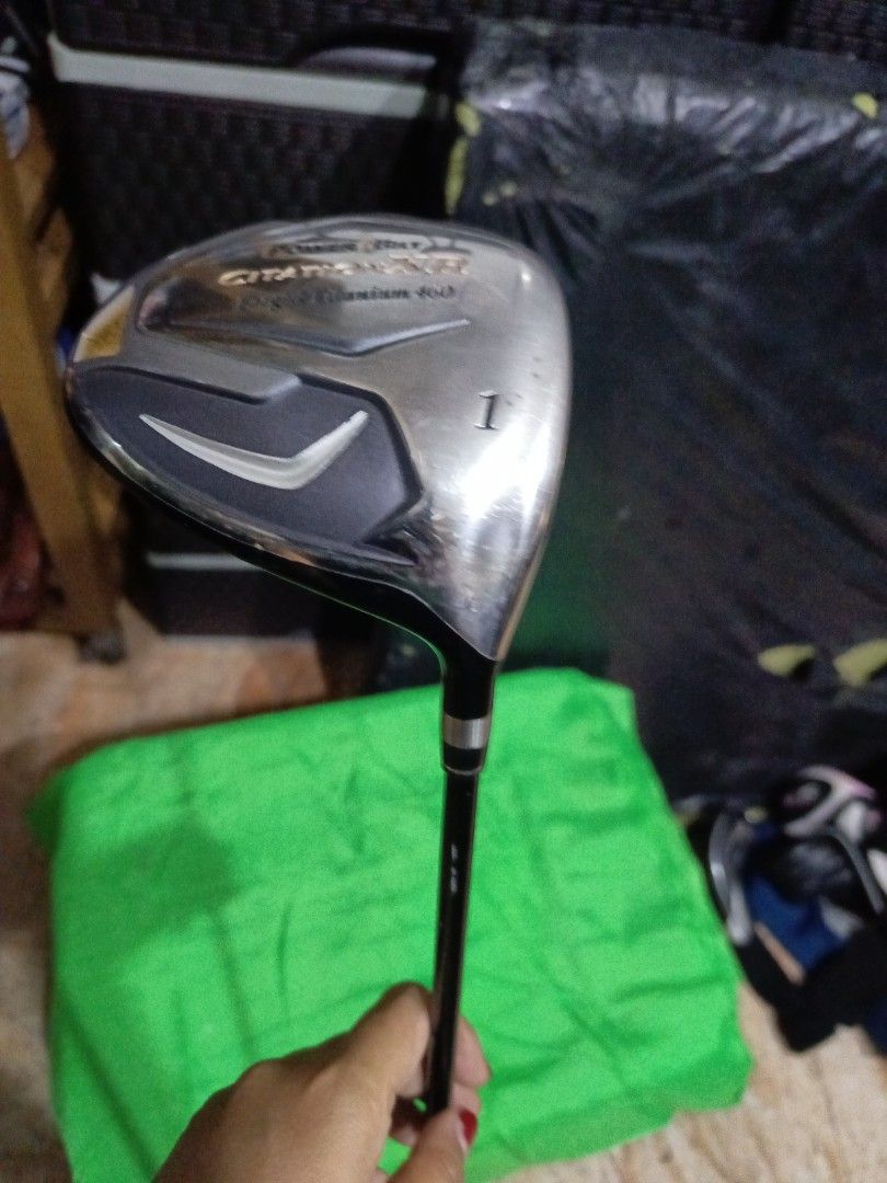 PowerBilt Citation XR Driver (Category: Golf) located in Manila. Submitted by yeonmei5614747 (Listing ID 1419640533, Image 2). Description: - PowerBilt Citation XR driver - Titanium face - 460cc head - Black shaft with PowerBilt branding - Black, textured grip - Silver and black club head design - Number "1" on top.
