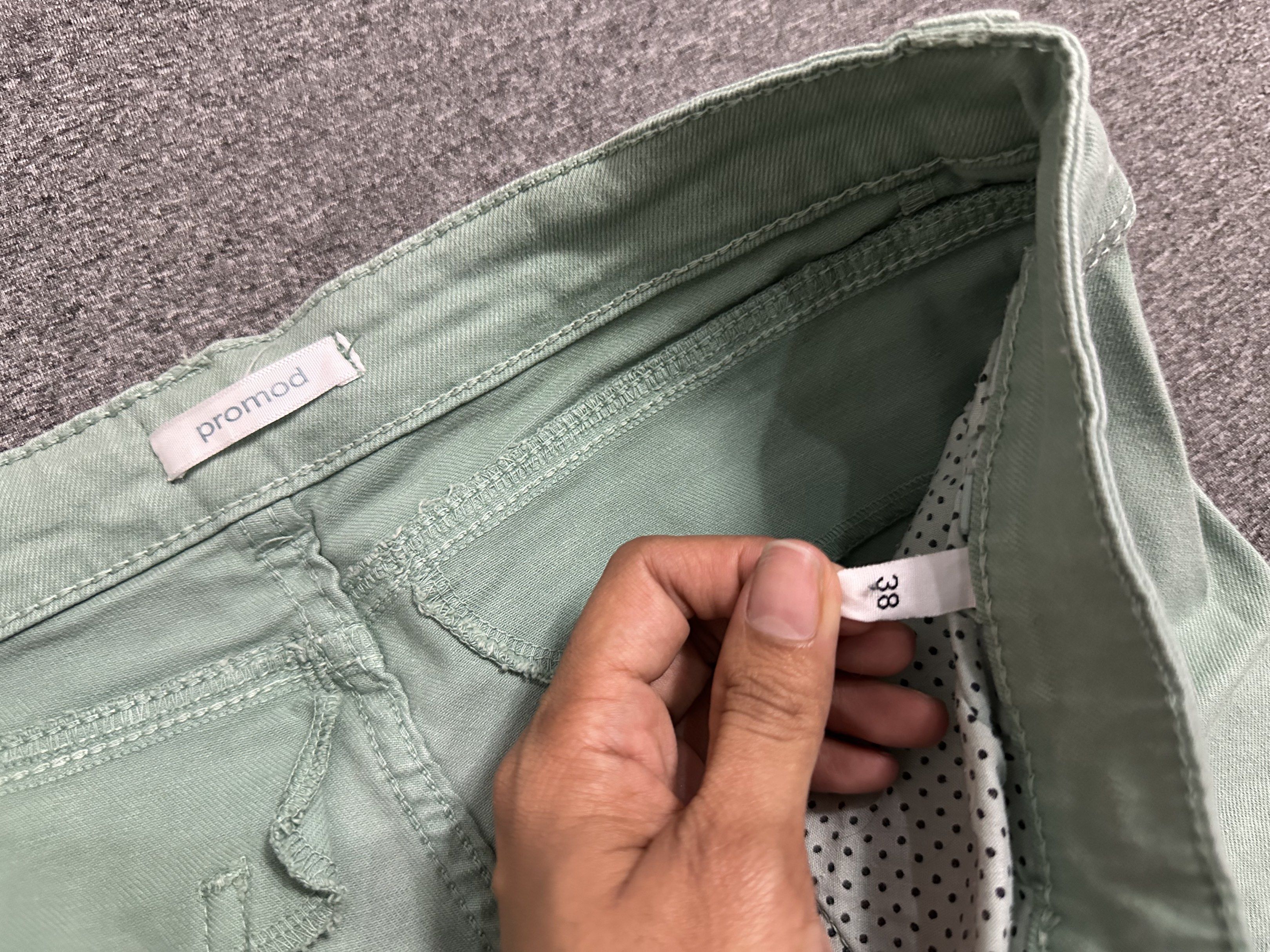 Promod Green Shorts Size 38 (Category: Shorts) located in Manila. Submitted by _lovedbyurstrully (Listing ID 1419658262, Image 3). Description: - Promod green shorts - Size 38 - Button and zipper closure - Two front pockets - Light green color - Cuffed hem.