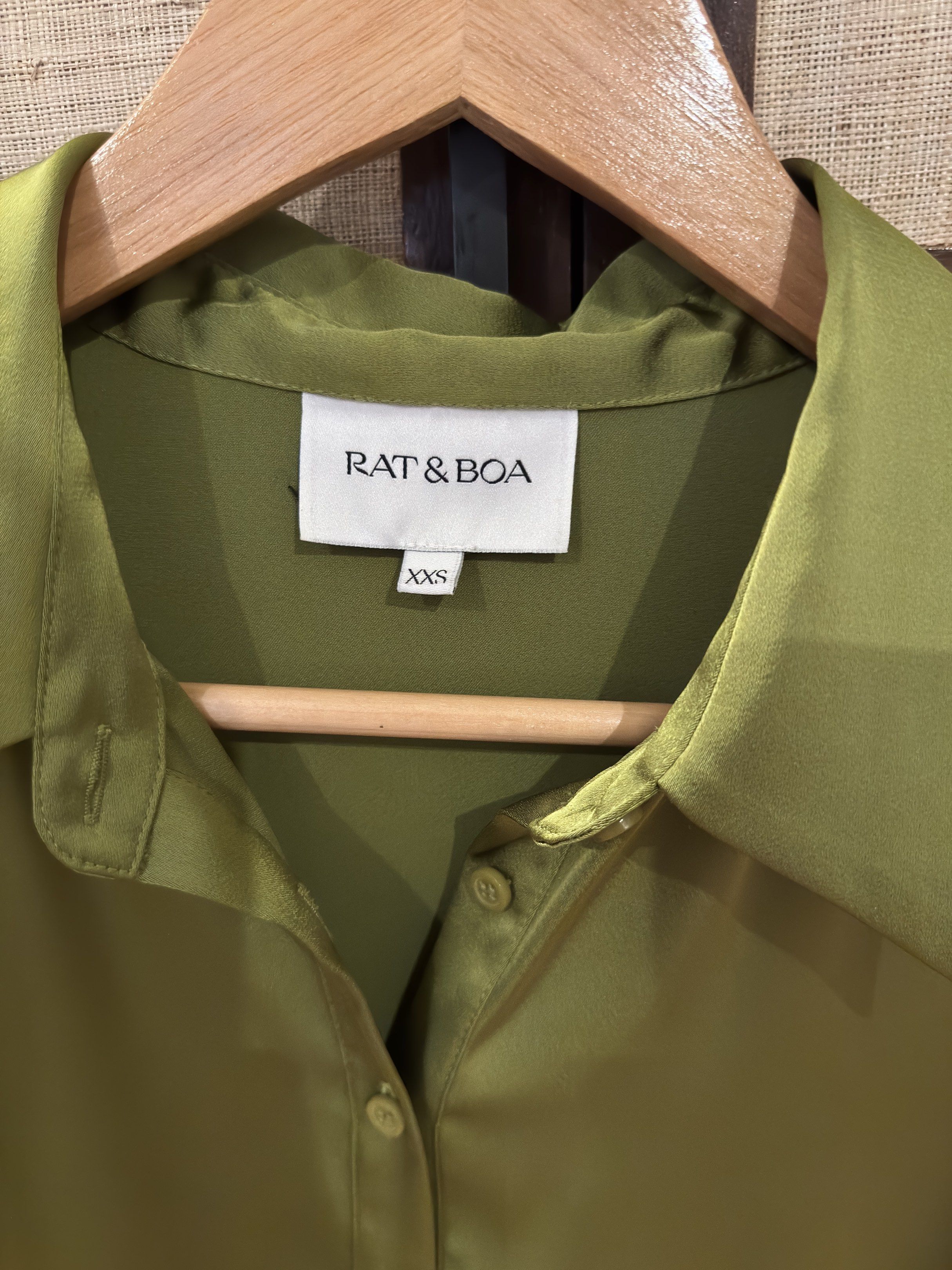 Rat & Boa Olive Green Mini Dress (Category: Dresses) located in Quezon City. Submitted by myclosetoverhaul2.0 (Listing ID 1419679586, Image 2). Description: - Rat & Boa mini dress - Color: Olive green - Size: XXS - Features: - Collared neckline - Long sleeves with cuff details - Tie waist - Button-down front - Silky material.