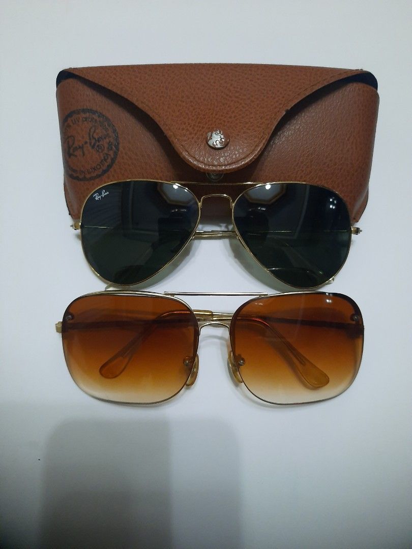 Ray-Ban / Lucky Star Sunglasses (Category: Sunglasses & Eyewear) located in Quezon City. Submitted by henco (Listing ID 1419726894, Image 1). Description: Ray-Ban clip-on sunglasses with gold frame. Includes green and brown lenses. Comes with a brown leather case. Made in Italy, and will include Lucky Star Sunglasses with frame marked "14K GP". pls. msg. or call 09279957180 for fast transactions..