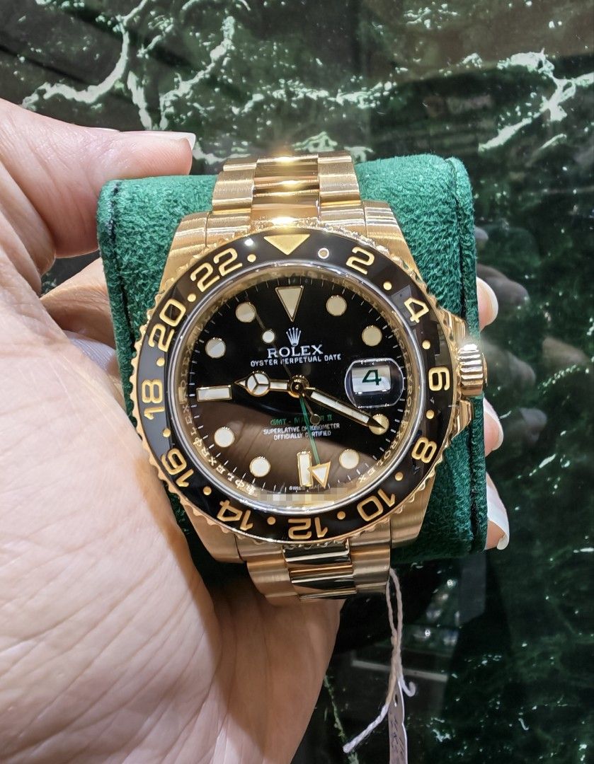 Rolex GMT master 2 full yellow gold black dial 116718ln (Category: Watches) located in Singapore. Submitted by hengwatch (Listing ID 1419746220, Image 1). Description: Rolex GMT master 2 full yellow gold black dial ceramic model 116718ln mint condition comes with box and cert dated August 2009 selling for $41600 hsbc and standard chartered and dbs and uob and OCBC ipp available 6/12/24 months OCBC 36 months located at the BENCOOLEN #01-80 Singapo