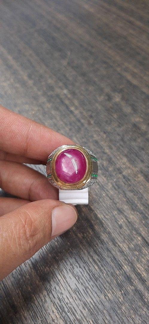 Ruby Gemstone Ring (Category: Rings) located in Singapore. Submitted by permataqolbu (Listing ID 1419745692, Image 1). Description: - Features a stunning ruby gemstone. - Gold and silver band. - Accented with green and clear stones. - Perfect for adding elegance to any look..