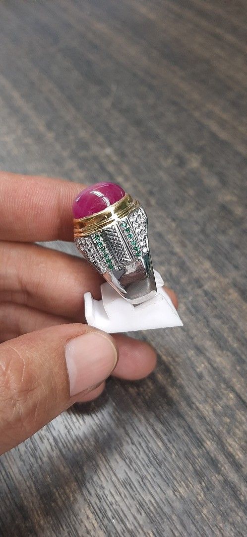 Ruby Gemstone Ring (Category: Rings) located in Singapore. Submitted by permataqolbu (Listing ID 1419745692, Image 3). Description: - Features a stunning ruby gemstone. - Gold and silver band. - Accented with green and clear stones. - Perfect for adding elegance to any look..