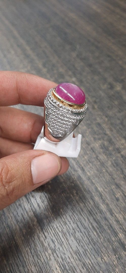 Ruby Gemstone Ring with Silver Setting (Category: Accessories) located in Singapore. Submitted by permataqolbu (Listing ID 1419746423, Image 2). Description: - Elegant ruby ring - Silver setting - Features a vibrant ruby gemstone - Accented with smaller stones - Perfect for adding sophistication.