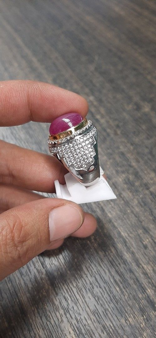 Ruby Gemstone Ring with Silver Setting (Category: Accessories) located in Singapore. Submitted by permataqolbu (Listing ID 1419746423, Image 3). Description: - Elegant ruby ring - Silver setting - Features a vibrant ruby gemstone - Accented with smaller stones - Perfect for adding sophistication.