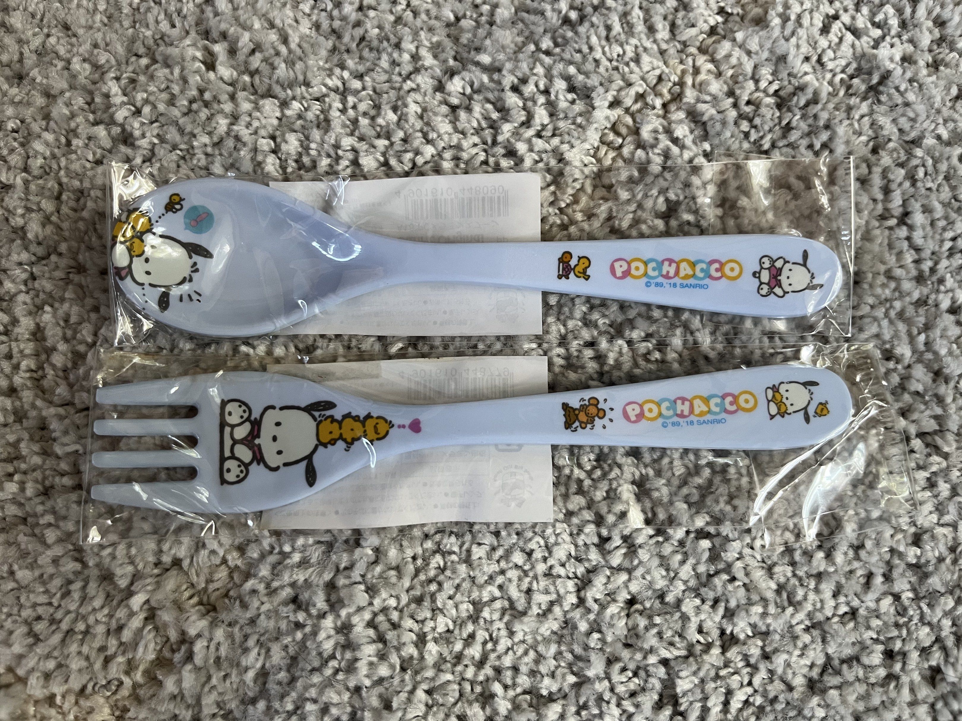 Sanrio Pochacco Spoon and Fork Set (Category: Dinnerware & Cutlery) located in Marikina City. Submitted by anythindahan (Listing ID 1419699603, Image 2). Description: 🍓original and bnew Sanrio Pochacco spoon and fork set from Japan - Includes one spoon and one fork. - Features a cute Pochacco design. - Color: Light blue. - Material: Melamine..