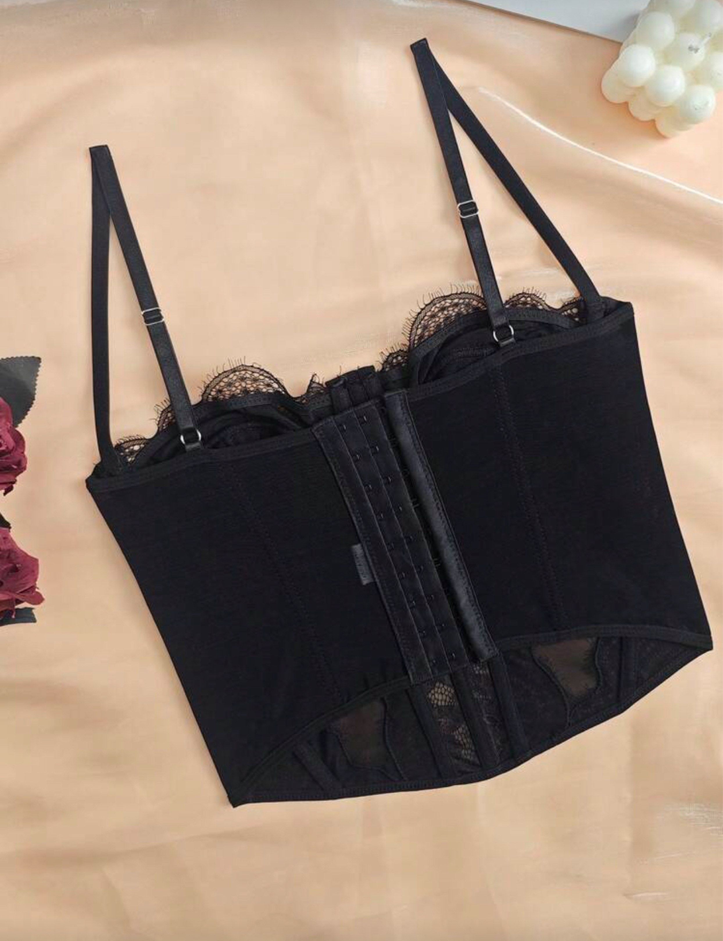 Shein Black Lace Corset Top (Category: Others Tops) located in Manila. Submitted by sl4ying (Listing ID 1419702173, Image 2). Description: - Black lace corset top - Adjustable straps - Hook-and-eye closure - Flattering silhouette - Perfect for layering or wearing alone - Versatile for different outfits.