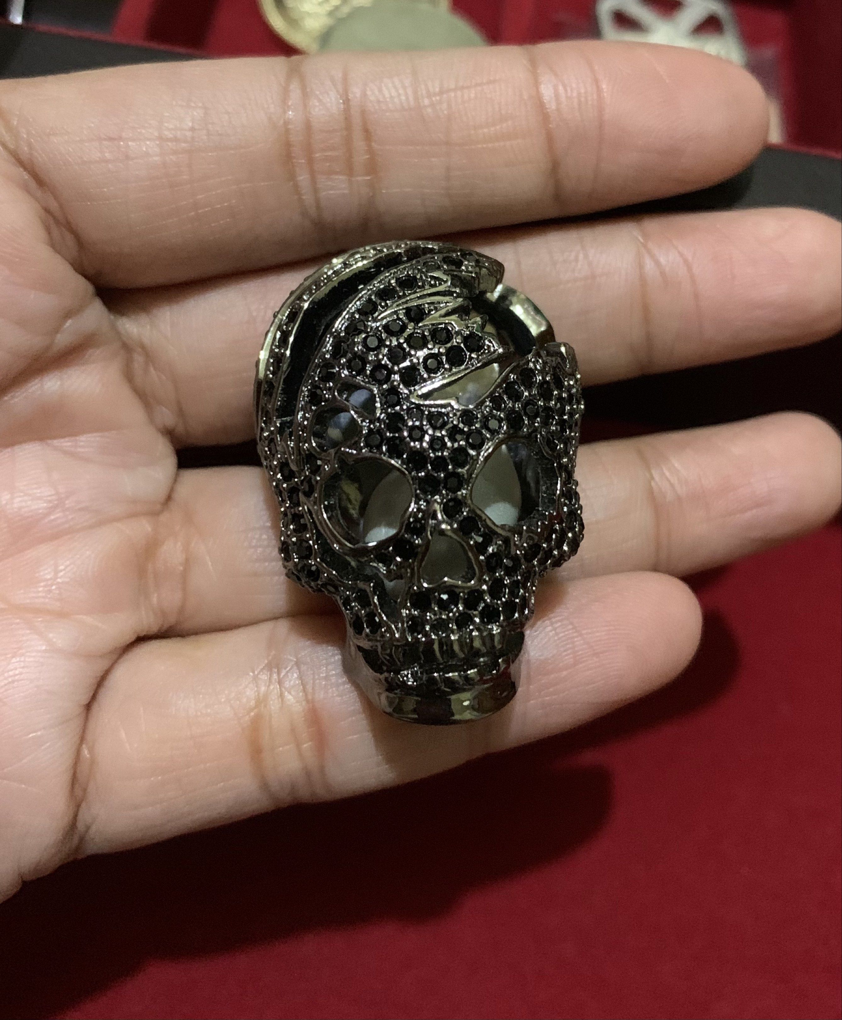 Skull Ring with Black Stones (Category: Rings) located in Quezon City. Submitted by ncjnc (Listing ID 1419713542, Image 1). Description: - Unique skull ring - Intricate detailing - Features black stones - Dark metallic finish - Simple, polished band - Statement piece.