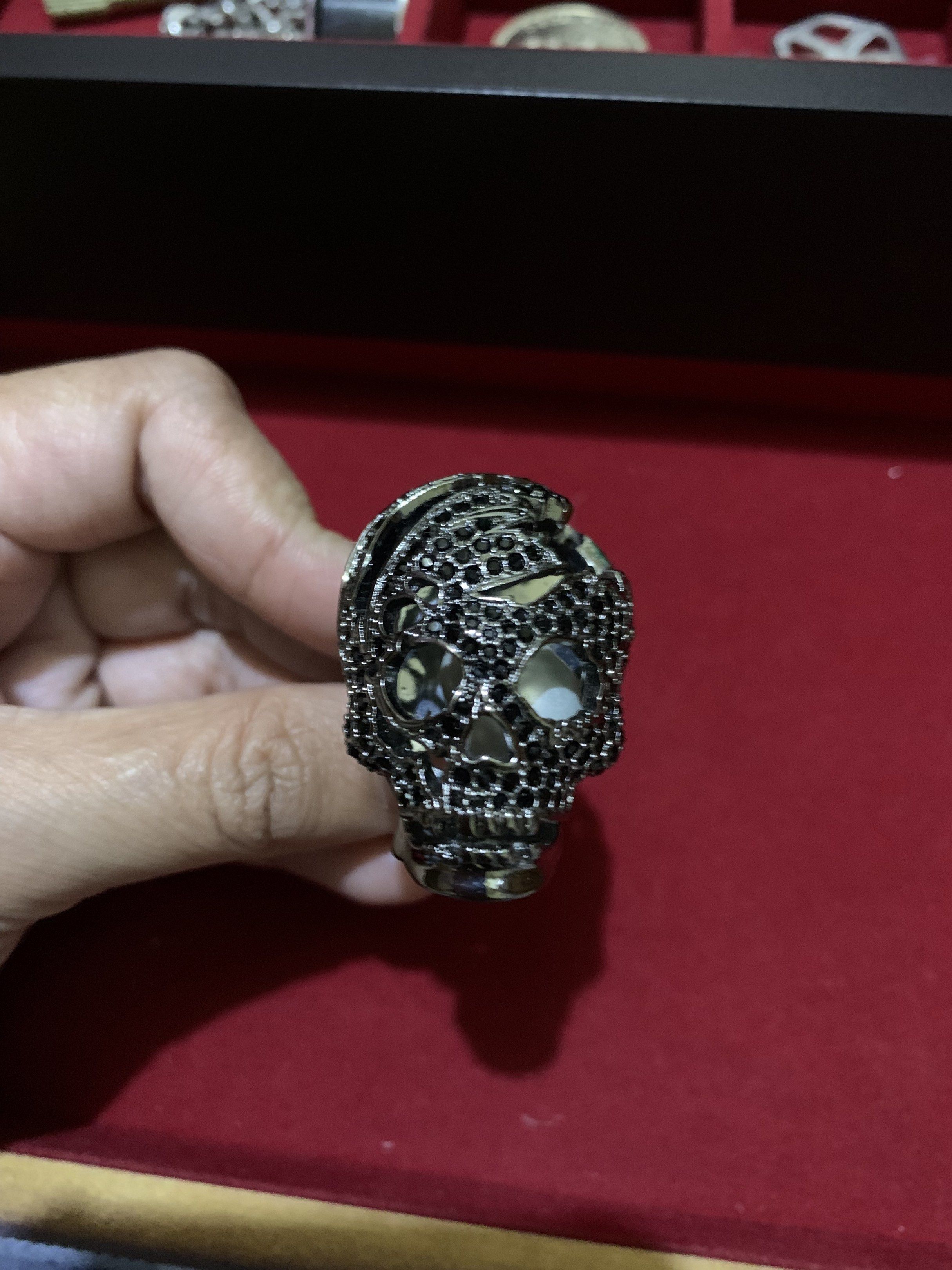 Skull Ring with Black Stones (Category: Rings) located in Quezon City. Submitted by ncjnc (Listing ID 1419713542, Image 3). Description: - Unique skull ring - Intricate detailing - Features black stones - Dark metallic finish - Simple, polished band - Statement piece.