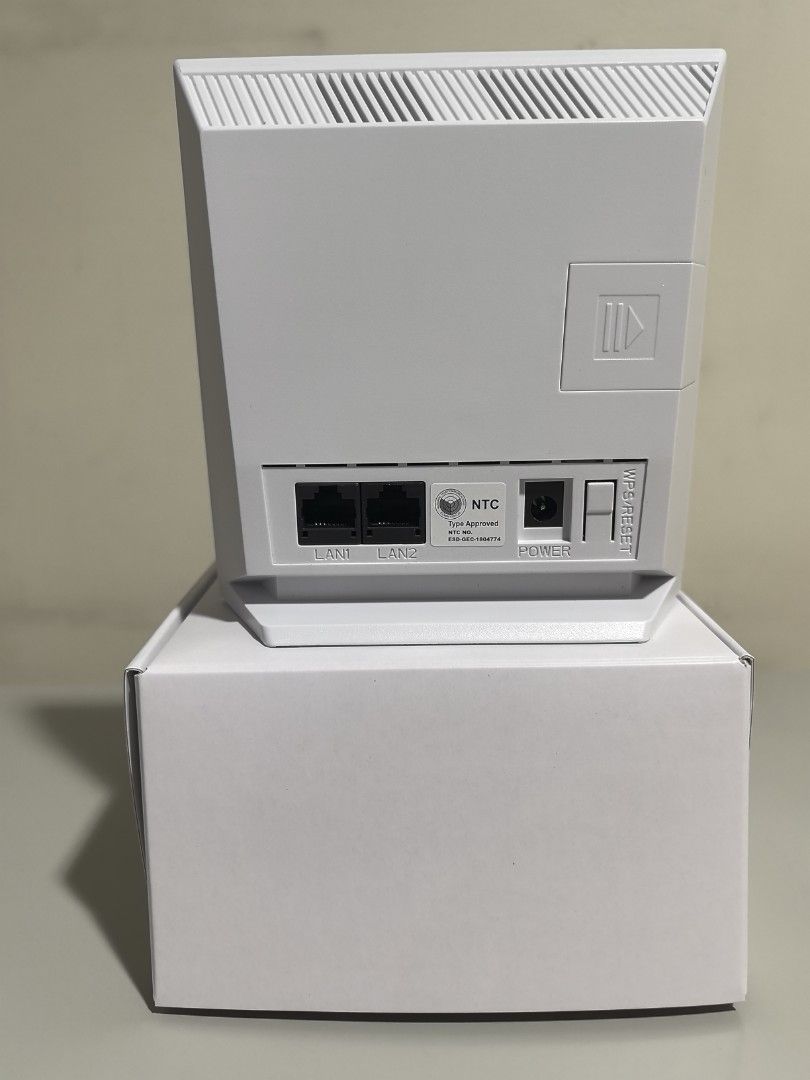 Smart Bro Home WiFi Router (Category: Networking) located in Quezon City. Submitted by mwwmson (Listing ID 1419621099, Image 2). Description: -locked wwt Bro Home WiFi router - Provides internet connectivity - Features LAN ports - Includes power input - Indicator lights on front - Comes with the box - Color: White -smart locked and no sim.