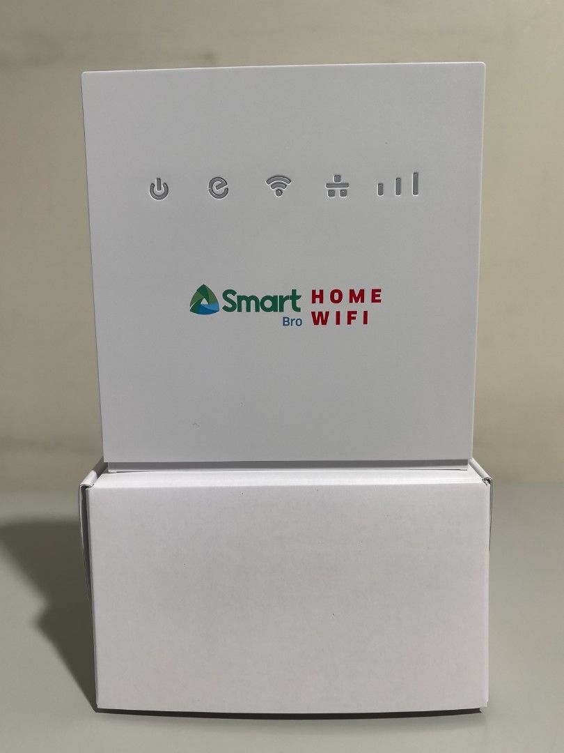 Smart Bro Home WiFi Router (Category: Networking) located in Quezon City. Submitted by mwwmson (Listing ID 1419621099, Image 1). Description: -locked wwt Bro Home WiFi router - Provides internet connectivity - Features LAN ports - Includes power input - Indicator lights on front - Comes with the box - Color: White -smart locked and no sim.