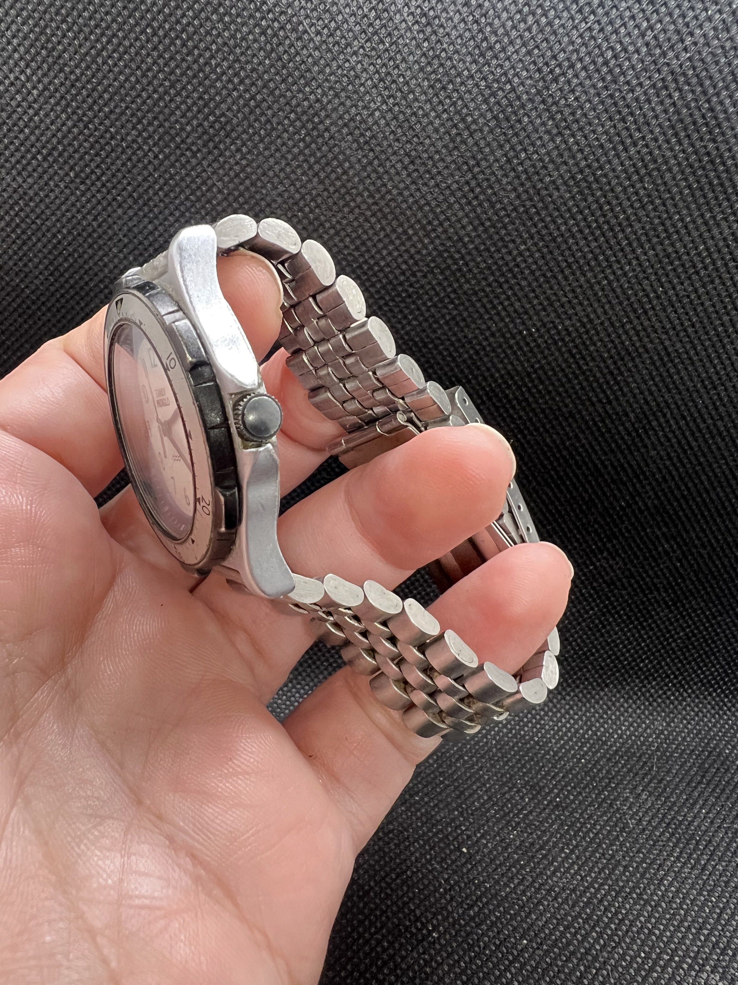 Timex Indiglo Quartz Mens Watch(read below) (Category: Men's Watches) located in Pasig City. Submitted by lailahbeauty (Listing ID 1419696092, Image 3). Description: For sale onhand Timex Indiglo Quartz mens Watch. Issue I cant open manually the case cover thats why I cant change the battery. But mostly working the batch for this one. I sale it as a junk! Original Preloved watch from Japan. Working /non working no details for this product. For mo
