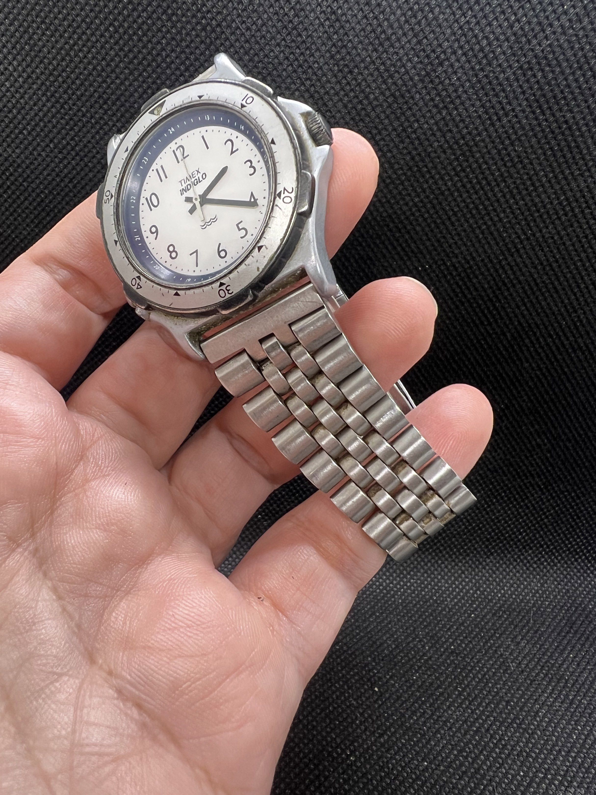Timex Indiglo Quartz Mens Watch(read below) (Category: Men's Watches) located in Pasig City. Submitted by lailahbeauty (Listing ID 1419696092, Image 2). Description: For sale onhand Timex Indiglo Quartz mens Watch. Issue I cant open manually the case cover thats why I cant change the battery. But mostly working the batch for this one. I sale it as a junk! Original Preloved watch from Japan. Working /non working no details for this product. For mo