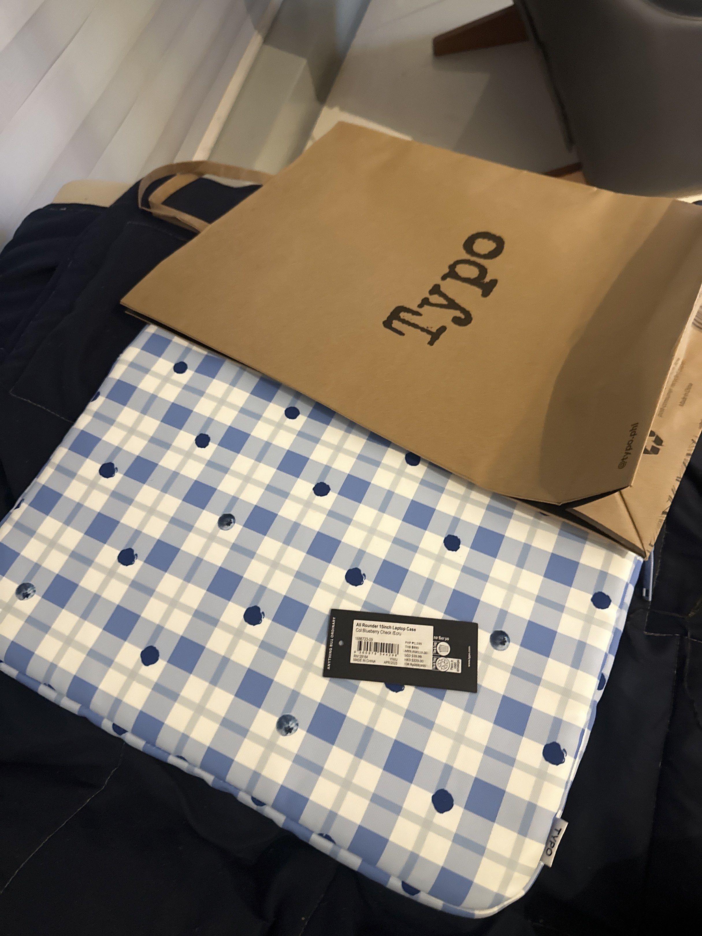 Typo Laptop Sleeve - Blue Gingham (Category: Laptop Bags & Sleeves) located in Taguig. Submitted by jsrbrandeditems (Listing ID 1419715108, Image 1). Description: - Typo laptop sleeve - Blue gingham pattern - Zipper closure - Soft interior - Comes with original packaging - Protects against scratches and minor impacts - Suitable for standard laptops -perfect for 15-16 inch laptop.