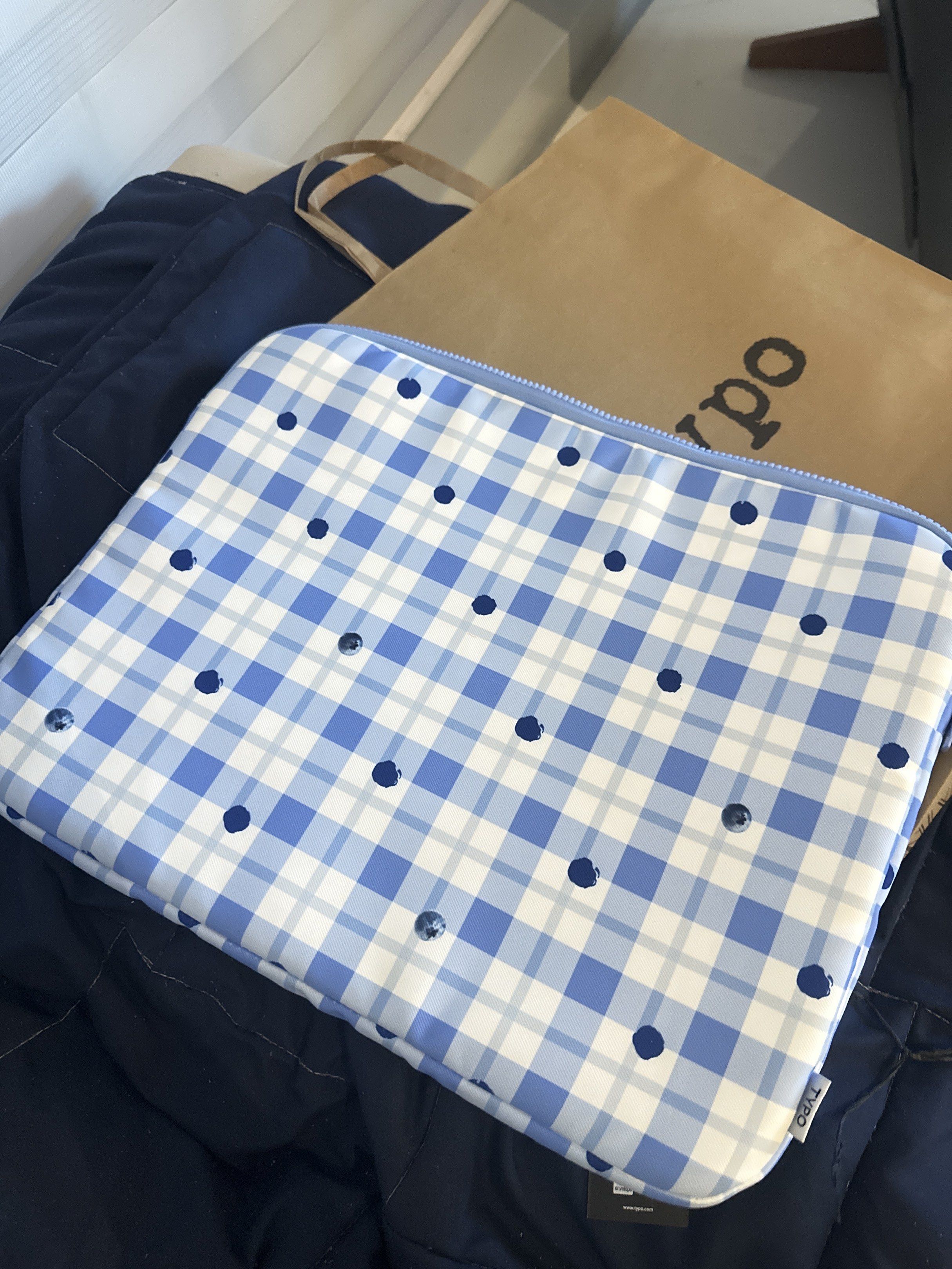 Typo Laptop Sleeve - Blue Gingham (Category: Laptop Bags & Sleeves) located in Taguig. Submitted by jsrbrandeditems (Listing ID 1419715108, Image 2). Description: - Typo laptop sleeve - Blue gingham pattern - Zipper closure - Soft interior - Comes with original packaging - Protects against scratches and minor impacts - Suitable for standard laptops -perfect for 15-16 inch laptop.
