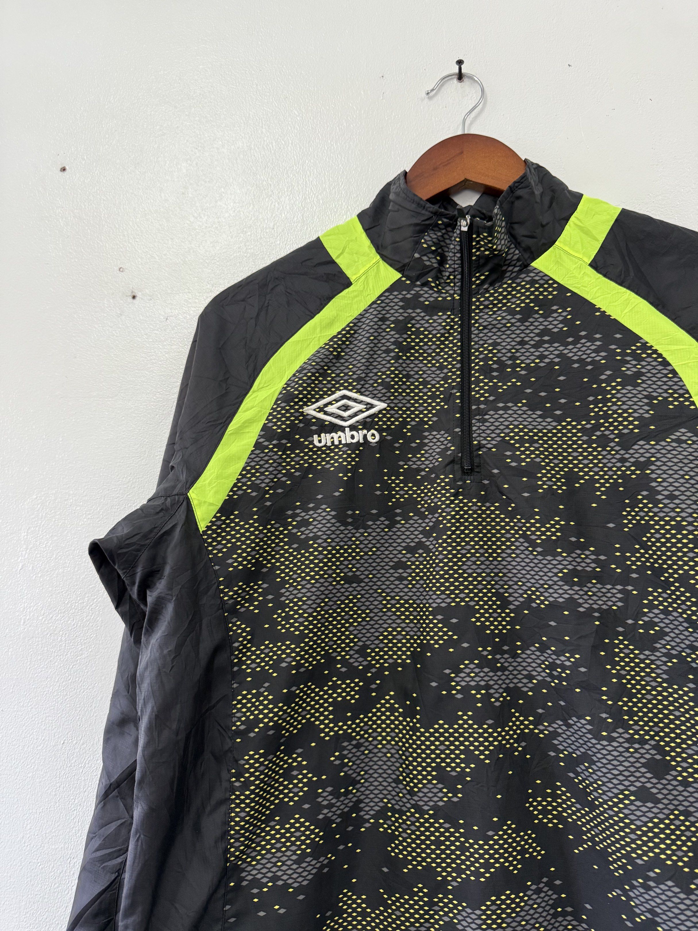 UMBRO Half Zip Windbreaker (Category: Coats, Jackets and Outerwear) located in Imus. Submitted by mbplph (Listing ID 1419704334, Image 2). Description: (UMBRO) Half Zip Windbreaker Size on Tag: L Dimensions: L 27 IN ~ W 22 IN Color: Black + Neon Green MEN BY PENNYLAINEPH PRICE: ₱499 ⚠️ SHIPPING NOT INCLUDED (PRICE + SF).