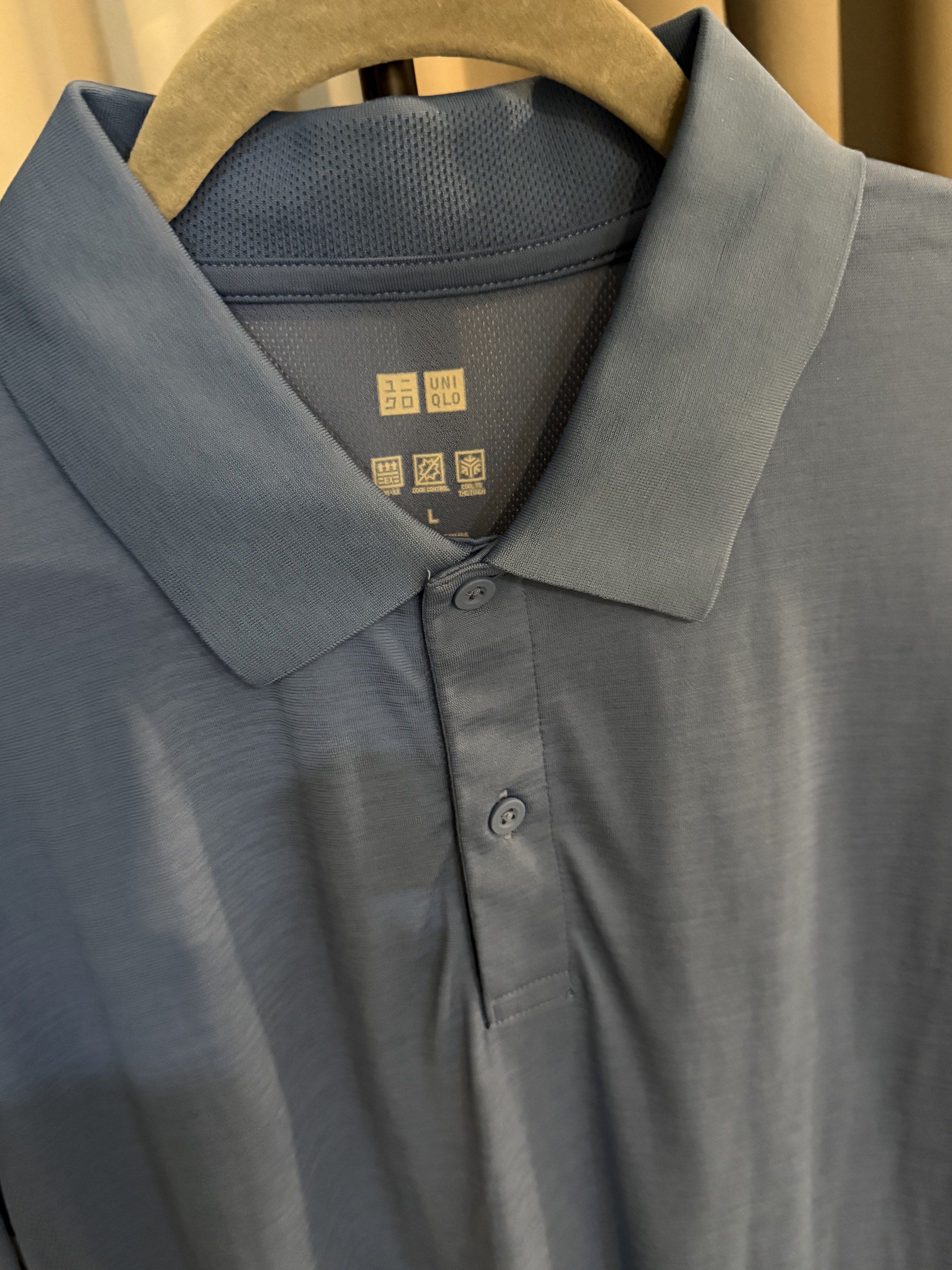 Uniqlo Polo Shirt - Large (Category: Tshirts & Polo Shirts ) located in Bacolod City. Submitted by sunbird_collection (Listing ID 1419709855, Image 2). Description: - Uniqlo blue polo shirt - Size: Large - Features a classic collar and button-down placket - Made of lightweight, breathable fabric - Ideal for warm weather - Short sleeves - Simple and clean design used around 5x.
