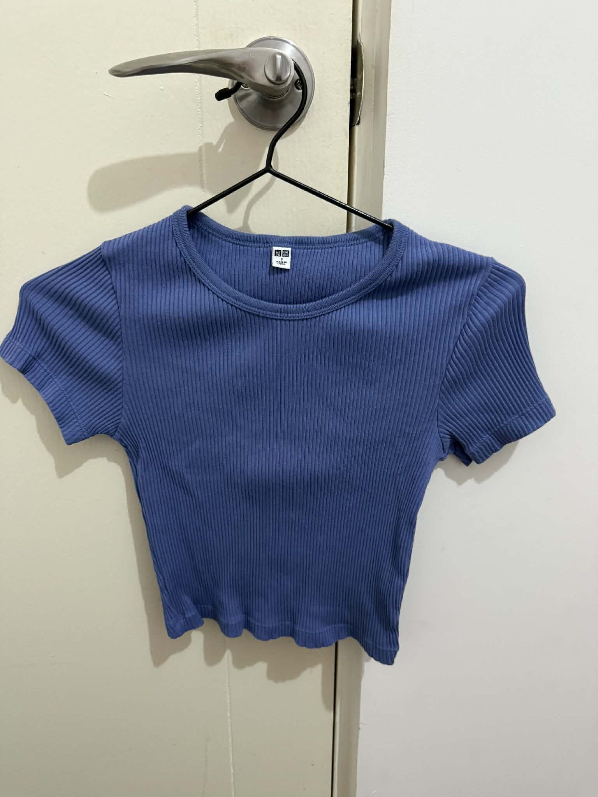 Uniqlo Ribbed Crop Top - Blue (Category: Shirts) located in Dasmarinas. Submitted by abebibobu (Listing ID 1419738298, Image 1). Description: - Uniqlo crop top - Size: Small - Color: Blue - Design: Ribbed - Neckline: Round - Sleeves: Short - Length: Cropped - Made in China.