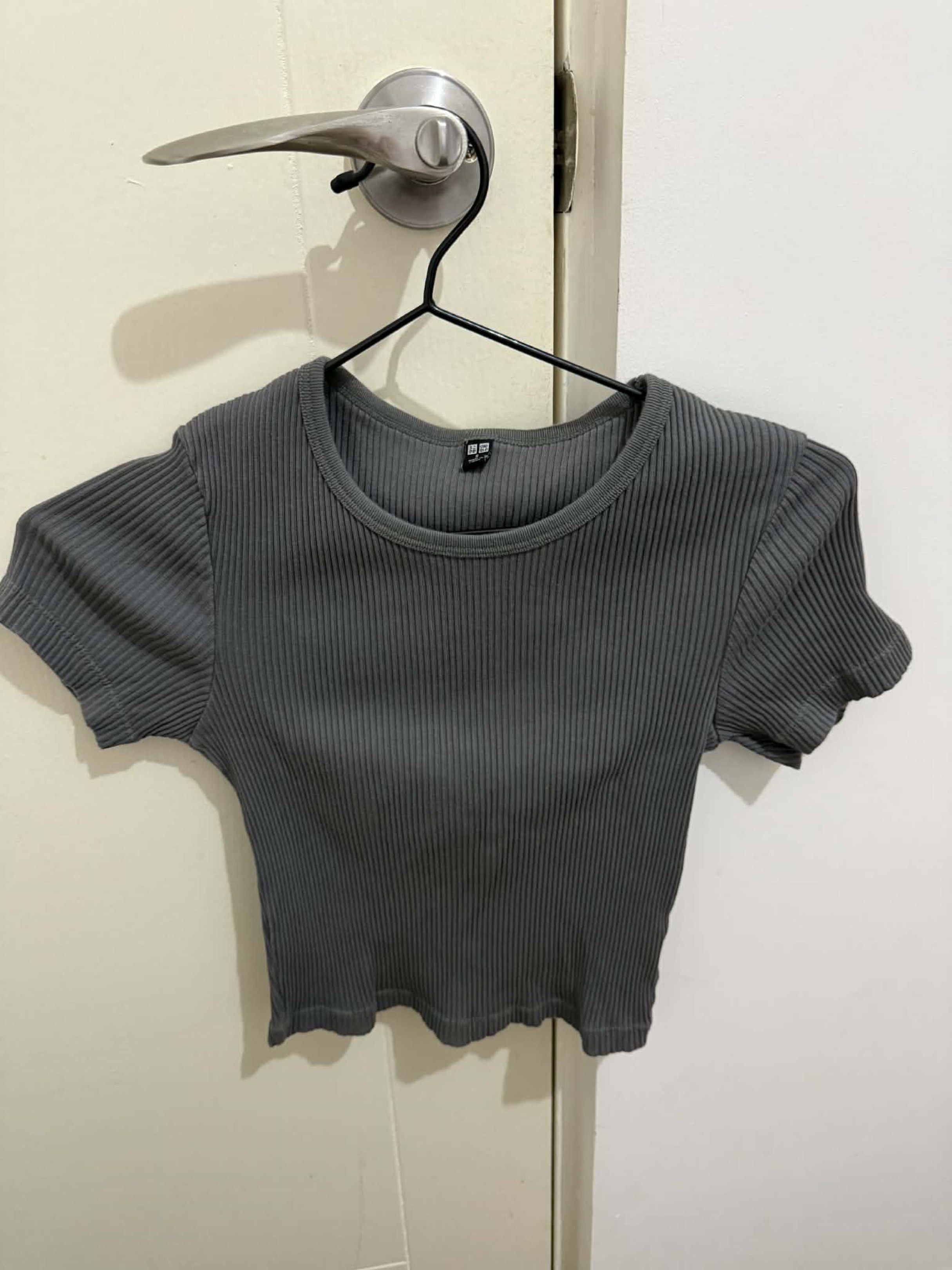 Uniqlo Ribbed Crop Top - Gray (Category: Shirts) located in Dasmarinas. Submitted by abebibobu (Listing ID 1419738198, Image 1). Description: - Uniqlo gray ribbed crop top - Size: S - Features: Round neckline, short sleeves, scalloped hem - Material: Ribbed knit - Made in China - Fitted silhouette.