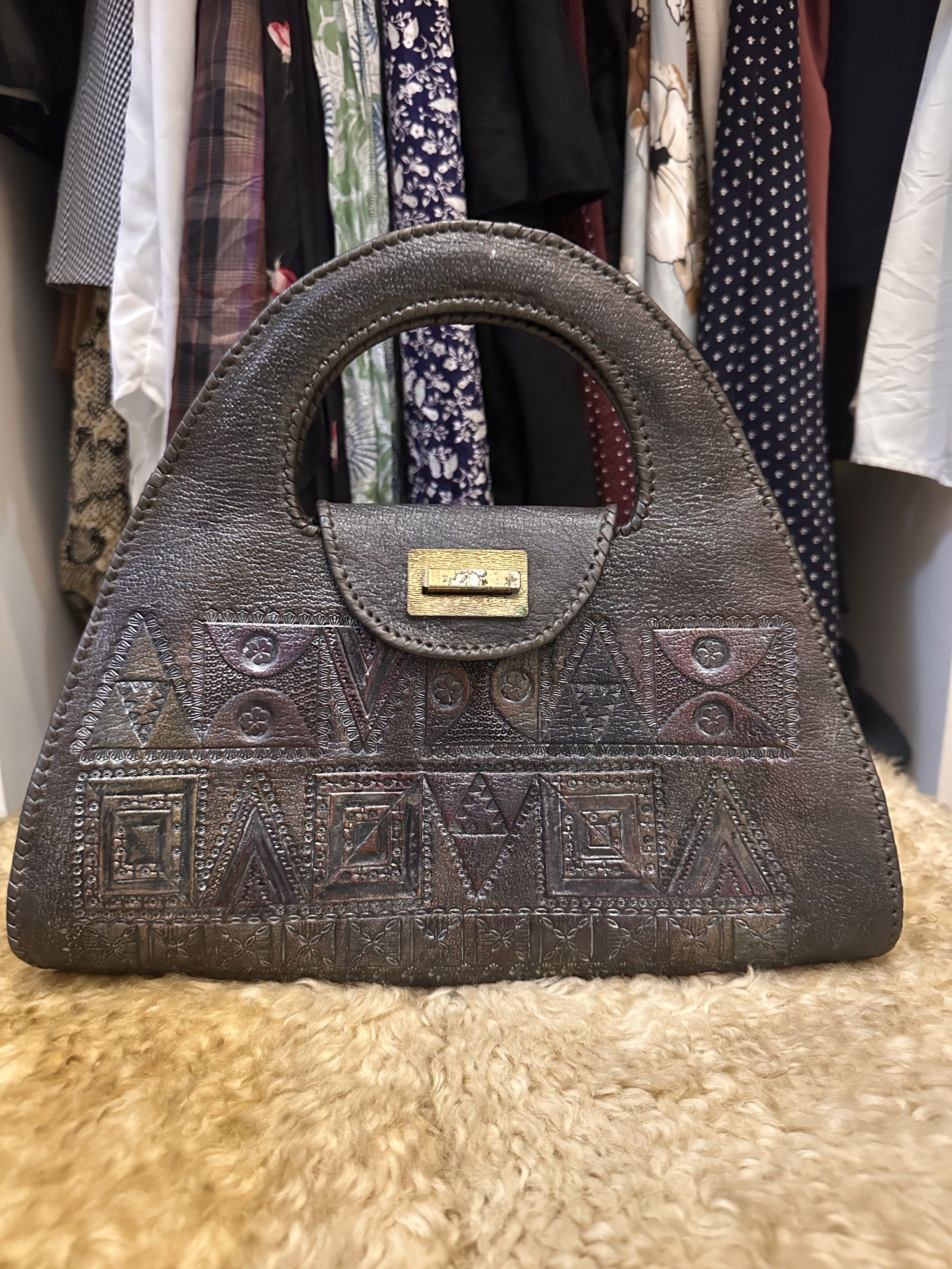 Vintage Handbag with Geometric Design (Category: Luxury Bags & Wallets) located in Digos. Submitted by puremountain.6f1756 (Listing ID 1419637331, Image 1). Description: - Vintage handbag - Unique geometric pattern - Japan made Tooled bag .