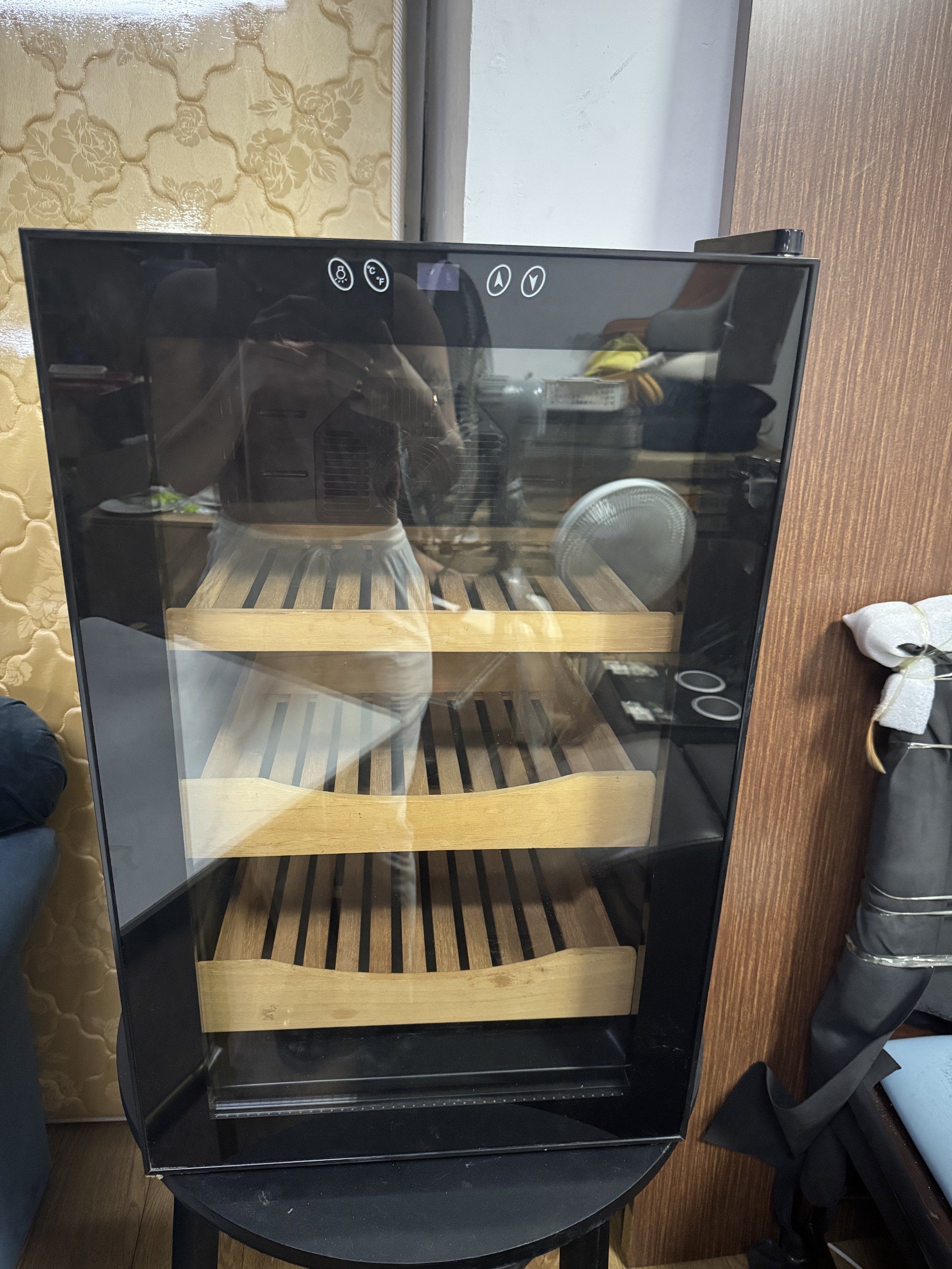 Wine Cooler with Wooden Shelves (Category: Food Organization & Storage) located in Manila. Submitted by marquezpa52205 (Listing ID 1419722694, Image 1). Description: - Sleek black design - Glass door - Multiple wooden shelves - Digital controls.