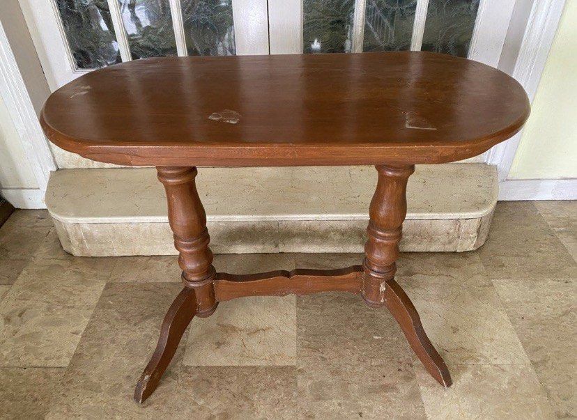 Wooden Oval Table (Category: Tables & Sets) located in Paranaque City. Submitted by bloo_berry (Listing ID 1419680954, Image 1). Description: Wooden Oval Table L36 x W17 x H27 inches Unknown wood Selling as is ₱4,850 SF c/o buyer NO RETURN NO EXCHANGE.