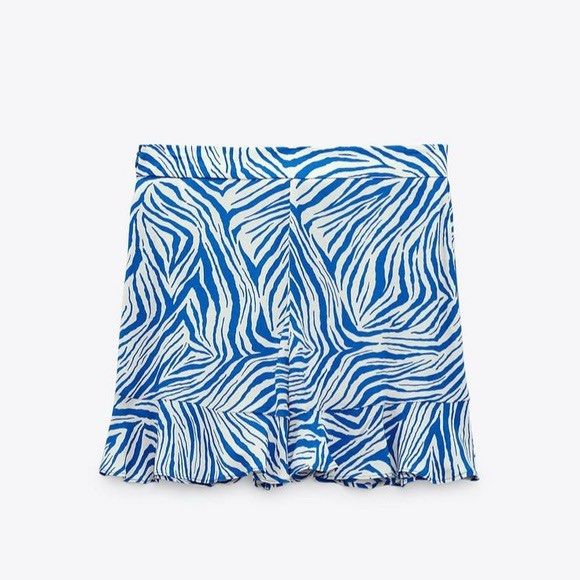 Zara Blue and White High-waisted Skort (Category: Shorts) located in Muntinlupa City. Submitted by lovedbysabel (Listing ID 1419706367, Image 3). Description: Perfect for summer szn! Used twice only. No flaws at all. Bought for 2k+ at Zara Greenbelt - Animal Print - Ruffled trim - Side hidden in-seam closure It's a bit wrinkled due to being stored in a closet for quite some time. Can send additional photos or do a video call for 100% transparency