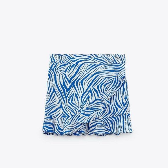 Zara Blue and White High-waisted Skort (Category: Shorts) located in Muntinlupa City. Submitted by lovedbysabel (Listing ID 1419706367, Image 2). Description: Perfect for summer szn! Used twice only. No flaws at all. Bought for 2k+ at Zara Greenbelt - Animal Print - Ruffled trim - Side hidden in-seam closure It's a bit wrinkled due to being stored in a closet for quite some time. Can send additional photos or do a video call for 100% transparency
