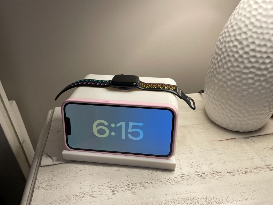2‑in‑1 MagSafe Compatible Stand – iPhone & Watch Holder (Category: Chargers & Cables) located in Mandaluyong City. Submitted by heyitslaaaance (Listing ID 1419830434, Image 3). Description: Transform your bedside table or desk with this MagSafe‑compatible 2‑in‑1 Stand, designed for both horizontal iPhone StandBy mode and Apple Watch charging. Its compact, rounded design blends seamlessly with bedroom décor while keeping your devices charged and a