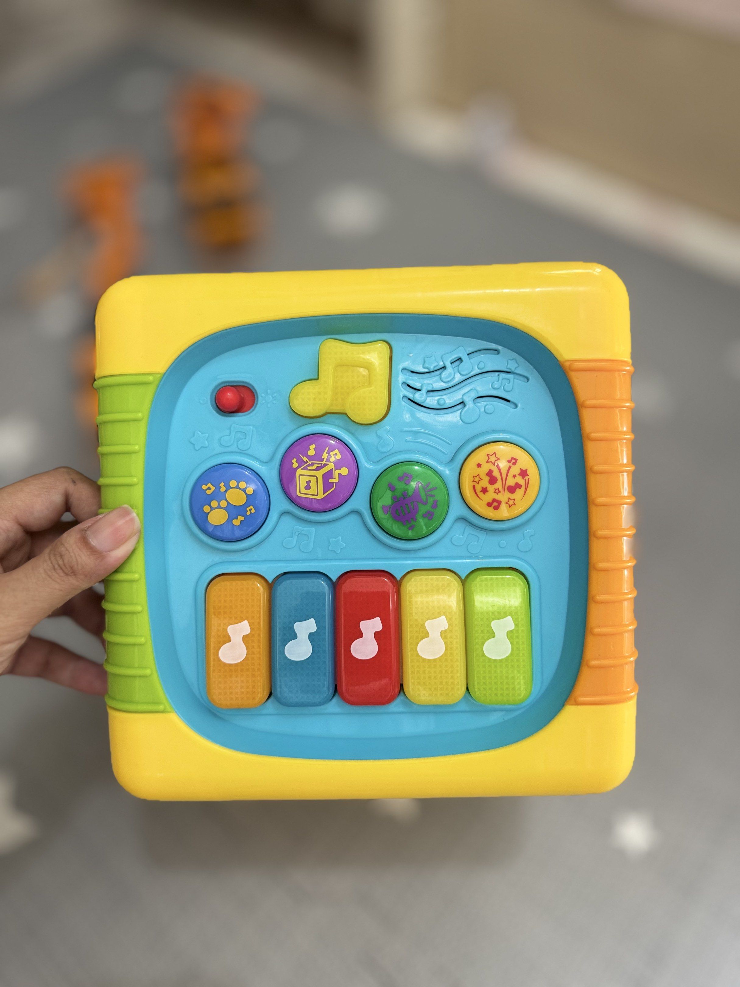 Activity Busy Cube Toy (Category: Infant Playtime) located in Bacoor. Submitted by darklab_project (Listing ID 1419896116, Image 3). Description: Bought this for P2500 - Interactive activity cube for toddlers. - Includes a drum, gears, shape sorter, and mirror. - Features a piano with musical notes. - Designed with bright, engaging colors. - Multiple buttons and shapes for interactive play..