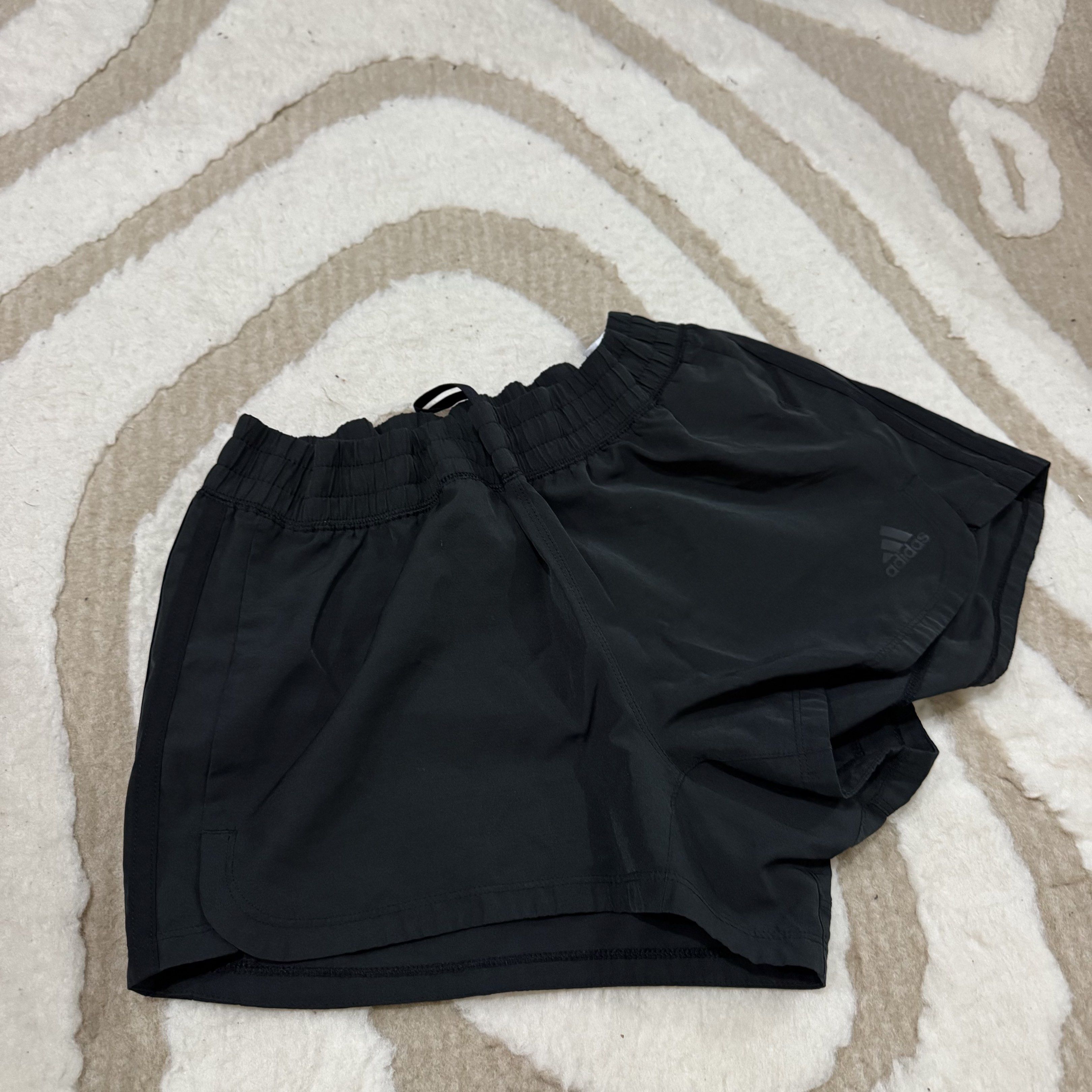 Adidas Aeroready Black Shorts (Category: Activewear) located in Makati City. Submitted by finders.keep.hers (Listing ID 1419834108, Image 3). Description: - Adidas black shorts - Aeroready technology for moisture-wicking - Elastic waistband for a comfortable fit - Lightweight material - Small Aeroready logo - Classic design, ideal for athletic activities.