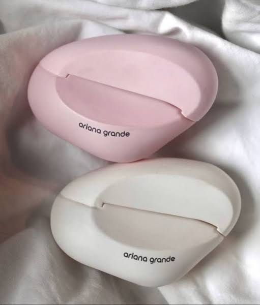 Ariana Grande Perfume Mod 7.5ml (Category: Fragrance & Deodorants) located in Manila. Submitted by cococlutters (Listing ID 1419813366, Image 2). Description: - Ariana Grande perfume - White, pebble-shaped bottle - Brand name visible on bottle - Part of a set.