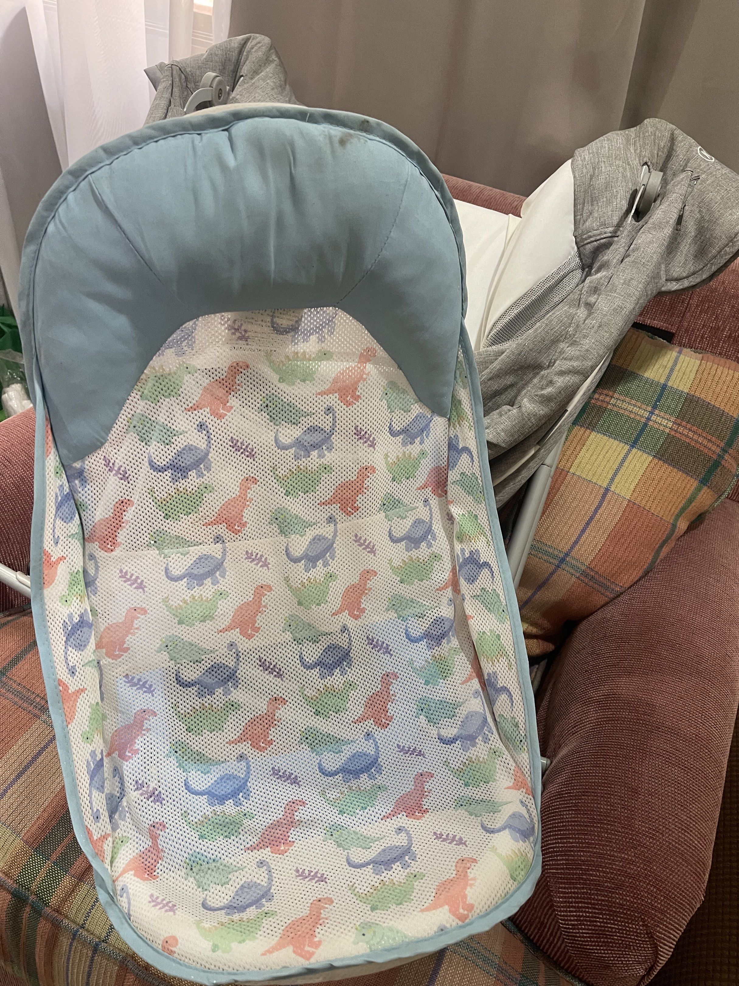 Baby Bouncer with Dinosaur Print and Teether (Category: Infant Playtime) located in Quezon City. Submitted by designerlifeph (Listing ID 1419812365, Image 1). Description: Freebies for the buyer.