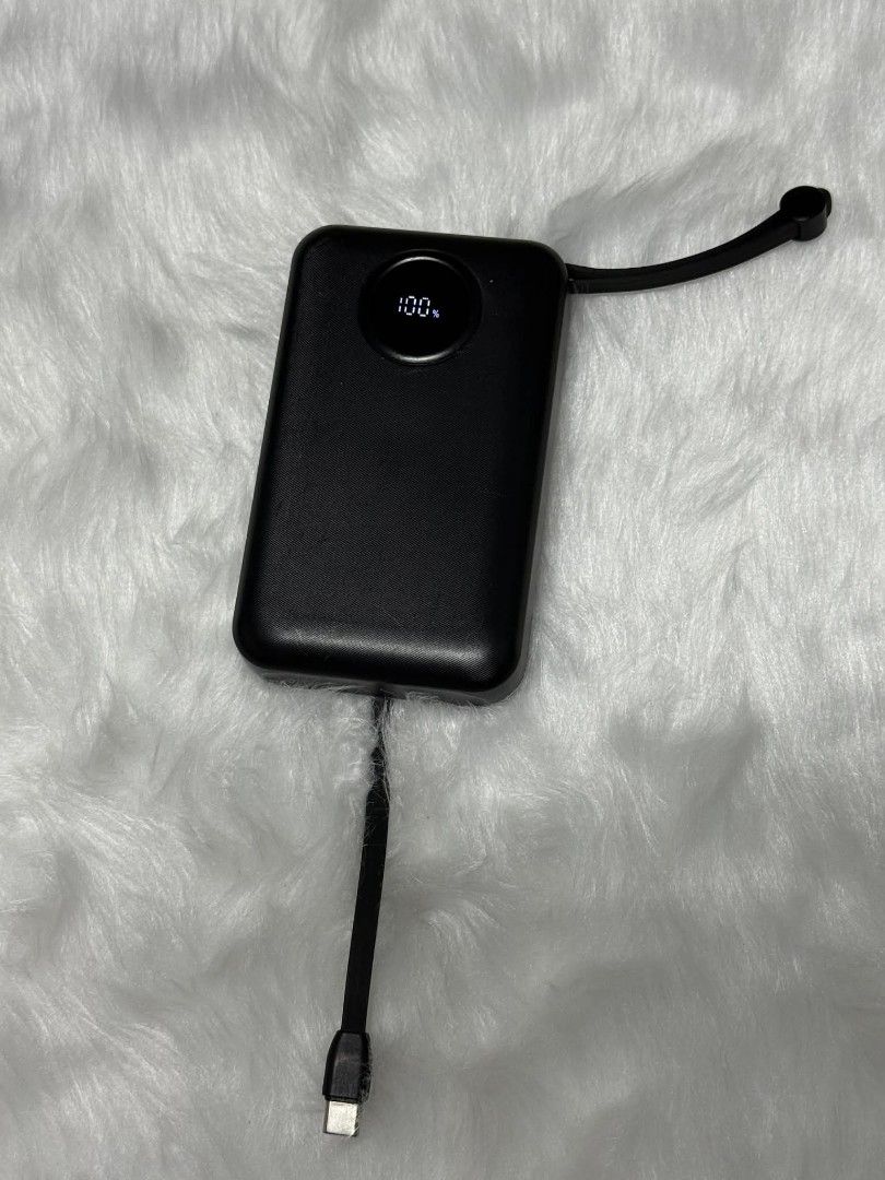 Black Rapoo 20000mAh Powerbank (Category: Cases & Sleeves) located in Manila. Submitted by abcdcv (Listing ID 1419933125, Image 3). Description: - heavy-duty - can full-charged 3 gadgets - like new‼️.