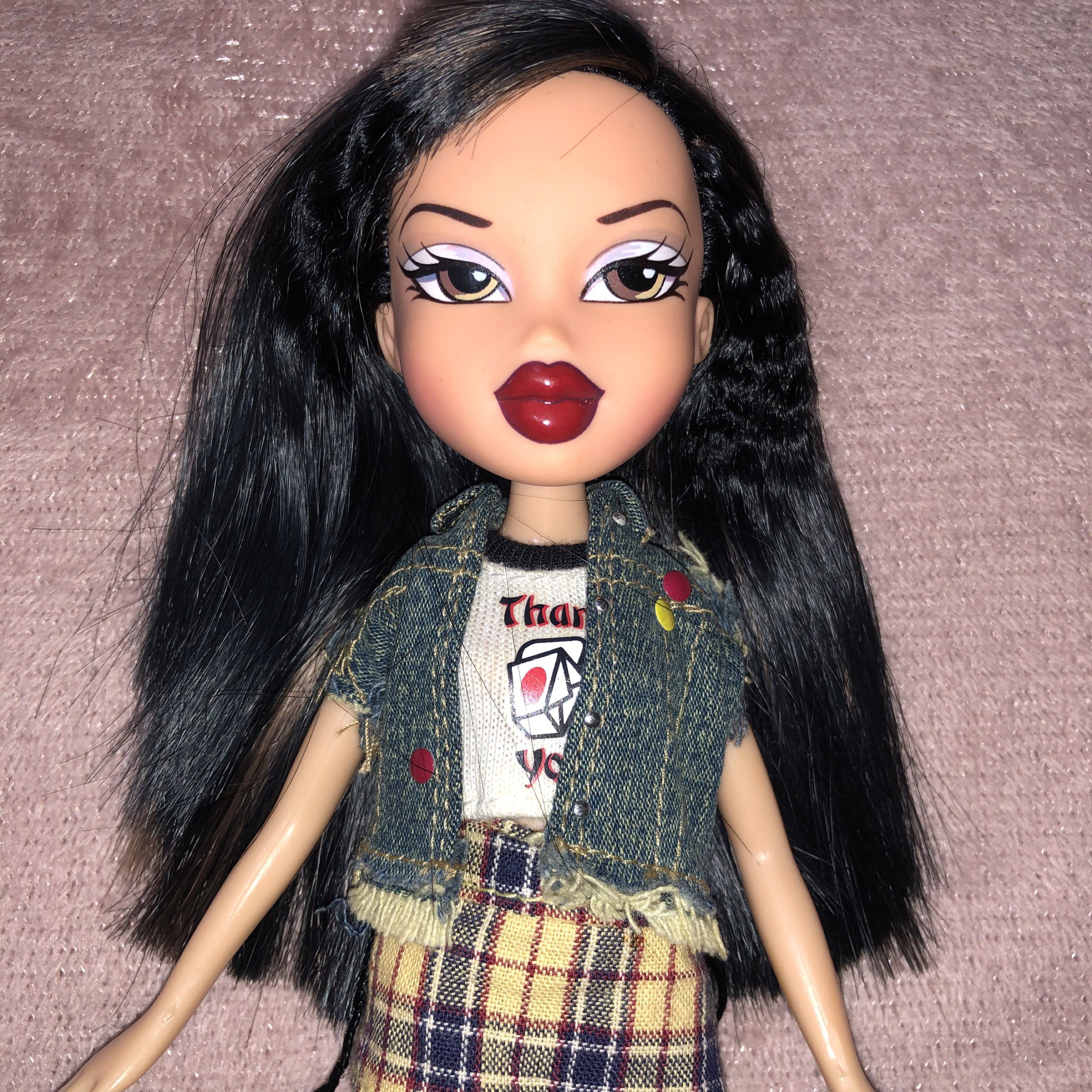 Bratz Style it Jade (Category: Kids Toys) located in Manila. Submitted by cheenamaure11483 (Listing ID 1419877544, Image 2). Description: Bratz Style it Jade -Wearing original outfit -No issues, No scratches -In good Conditon - Long black hair - Denim vest - Plaid skirt - White shirt with graphic print - Black boots - Brown eyes - Red lipstick Shipping Method: Lalamove & Jnt Payment Method: Gcash & BDO DM/PM for more info🙂 .