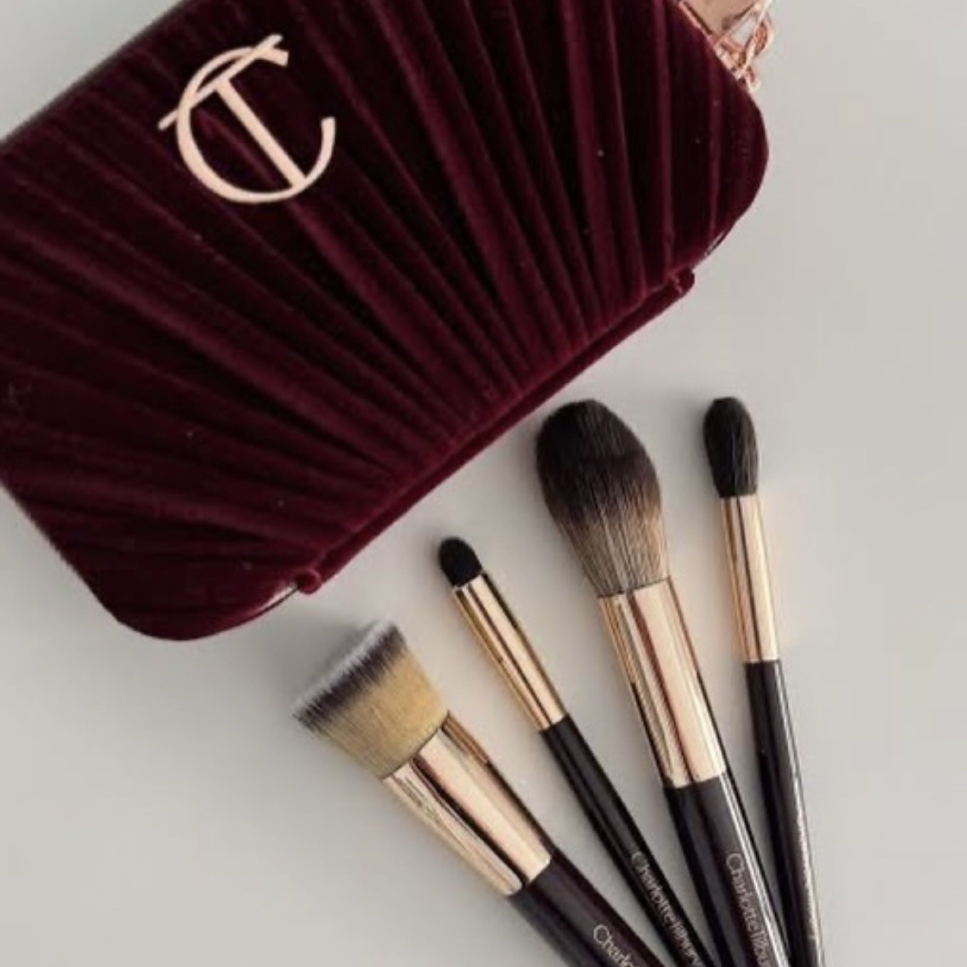 Charlotte Tilbury Makeup Brush Set with Pouch (Category: Makeup) located in Bulacan. Submitted by aria074 (Listing ID 1419947451, Image 2). Description: CT Velvet Pouch w/ 4pcs Brush Set Includes: Powder and sculpt brush Eye blender brush Eye smudger brush Eye/lip precision brush Signature velvet pouch.