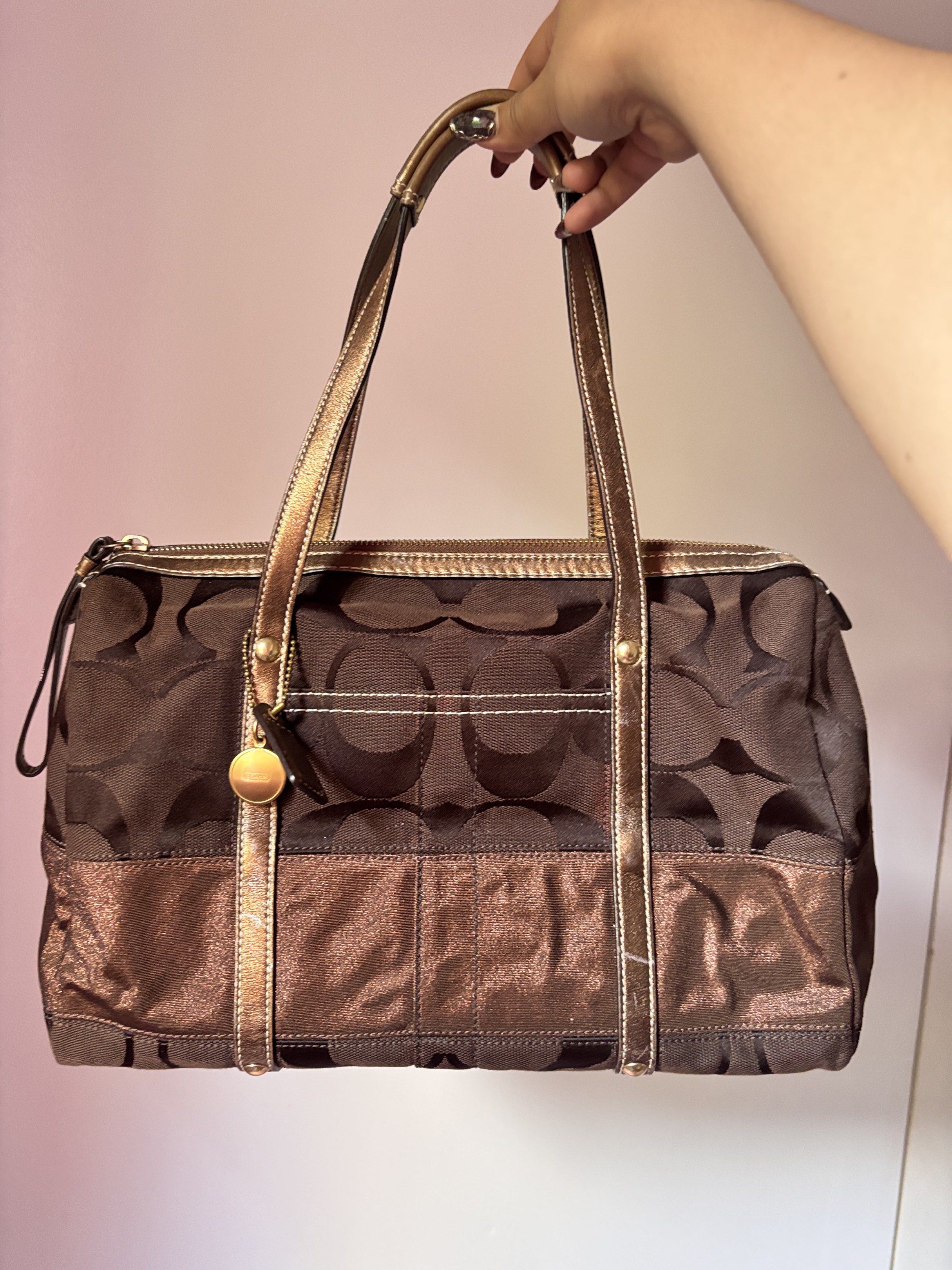 Coach Brown Boston Satchel Handbag (Category: Luxury Bags & Wallets) located in Paranaque City. Submitted by lovedbydevi (Listing ID 1419892558, Image 1). Description: fs: coach boston bag in chocolate brown slightly nego overall good condition with hangtag malinis loob minor issues: slight fading sa metallic parts open for vc.