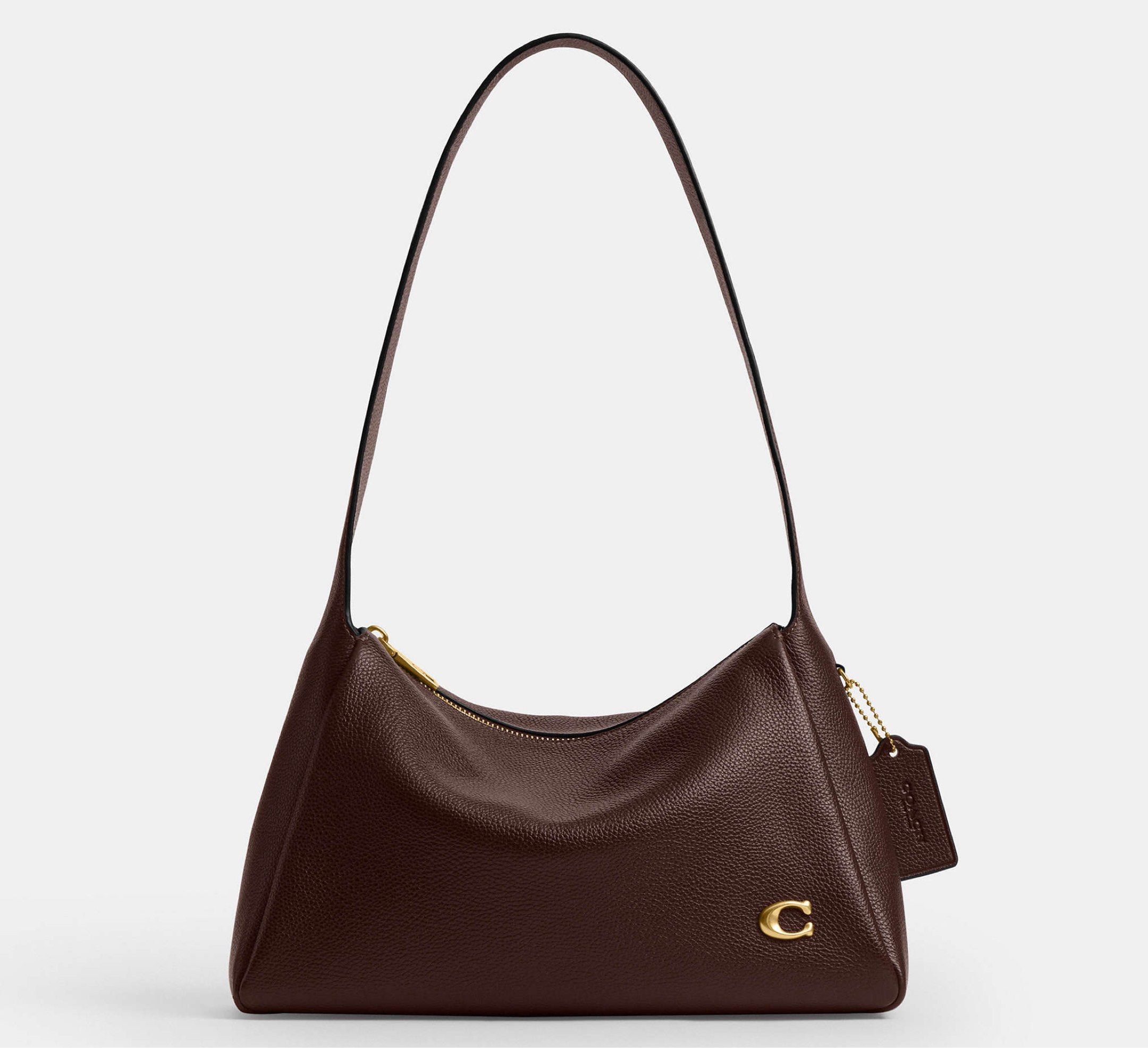 Coach Lola Shoulder Bag in Brass/Maple (Category: Shoulder Bags) located in Marikina City. Submitted by smthxtra (Listing ID 1419873725, Image 1). Description: Length: 11.5” Height: 7.25” Width: 4.0” Handle with 10.5” drop Inside snap pocket Zip-top closure With tag, care card, dust bag, and paper bag included.