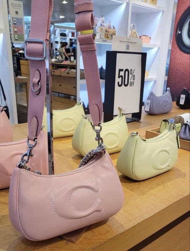 Coach Teri Shoulder Bag in Pink (Category: Luxury Bags & Wallets) located in Manila. Submitted by shop.declutter (Listing ID 1419938415, Image 1). Description: 2 way — shoulder & crossbody bag Crossbody straps are still unused [Color may vary due to lighting].
