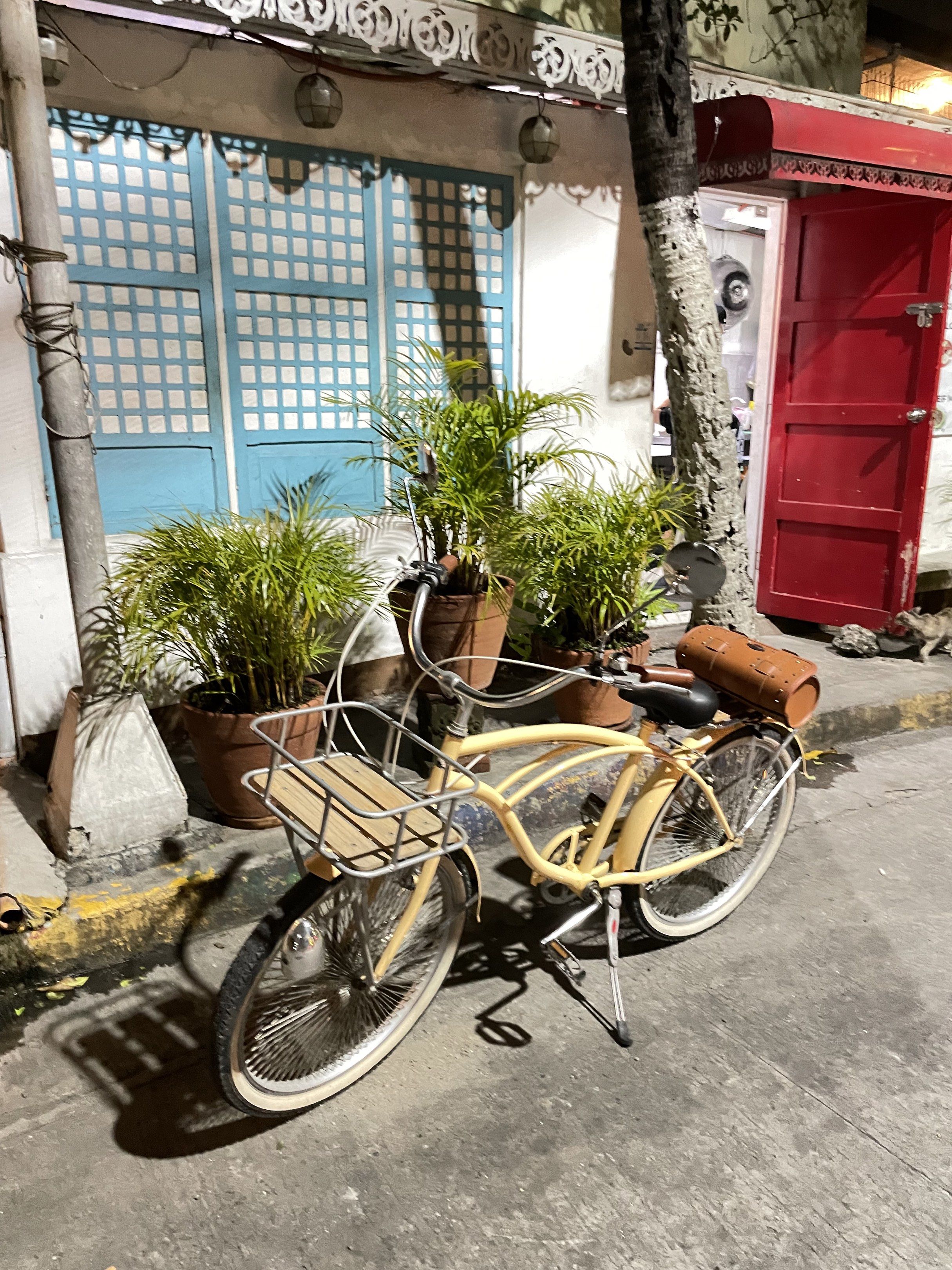 Custom Cruiser Bike with Accessories (Category: Bicycles) located in Manila. Submitted by ragssurplus (Listing ID 1419784127, Image 3). Description: - Custom cruiser bike with a unique design - Cream-colored frame - White-walled tires - Wooden basket - Custom leather bag with Harley-Davidson logo - Comfortable black seat - Brown leather grips - Perfect for leisurely rides.