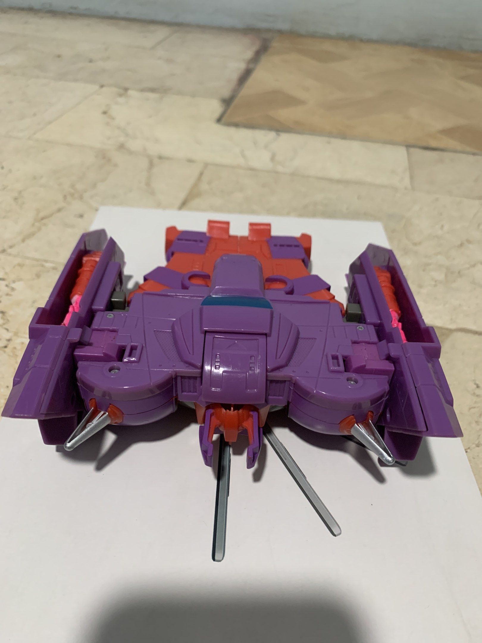 Cybertron Transformers Alpha Trion (Category: Action & Battle Toys) located in Valenzuela. Submitted by rjtoysjapan0306 (Listing ID 1419904952, Image 3). Description: ‼️‼️Sale Sale Sale ‼️‼️ Cybertron Alpha Trion Original Hasbro -7 inches - Transformers Armada Thrust figure - Transforms between jet and robot modes - Features a purple and red color scheme - Robot mode has a distinctive head design with a long, white face and silver accents - Jet m