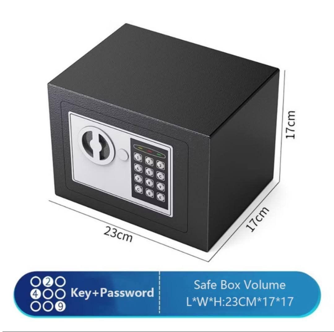 Digital Safe Box with Key and Password (Category: Safe) located in Manila. Submitted by yzlshop (Listing ID 1419863935, Image 1). Description: Safe box offers both key and password access for secure storage. It features a digital keypad and a manual key override. The dimensions are 23cm (L) x 17cm (W) x 17cm (H). It is ideal for safeguarding valuables at home or in the office. The safe box is black..