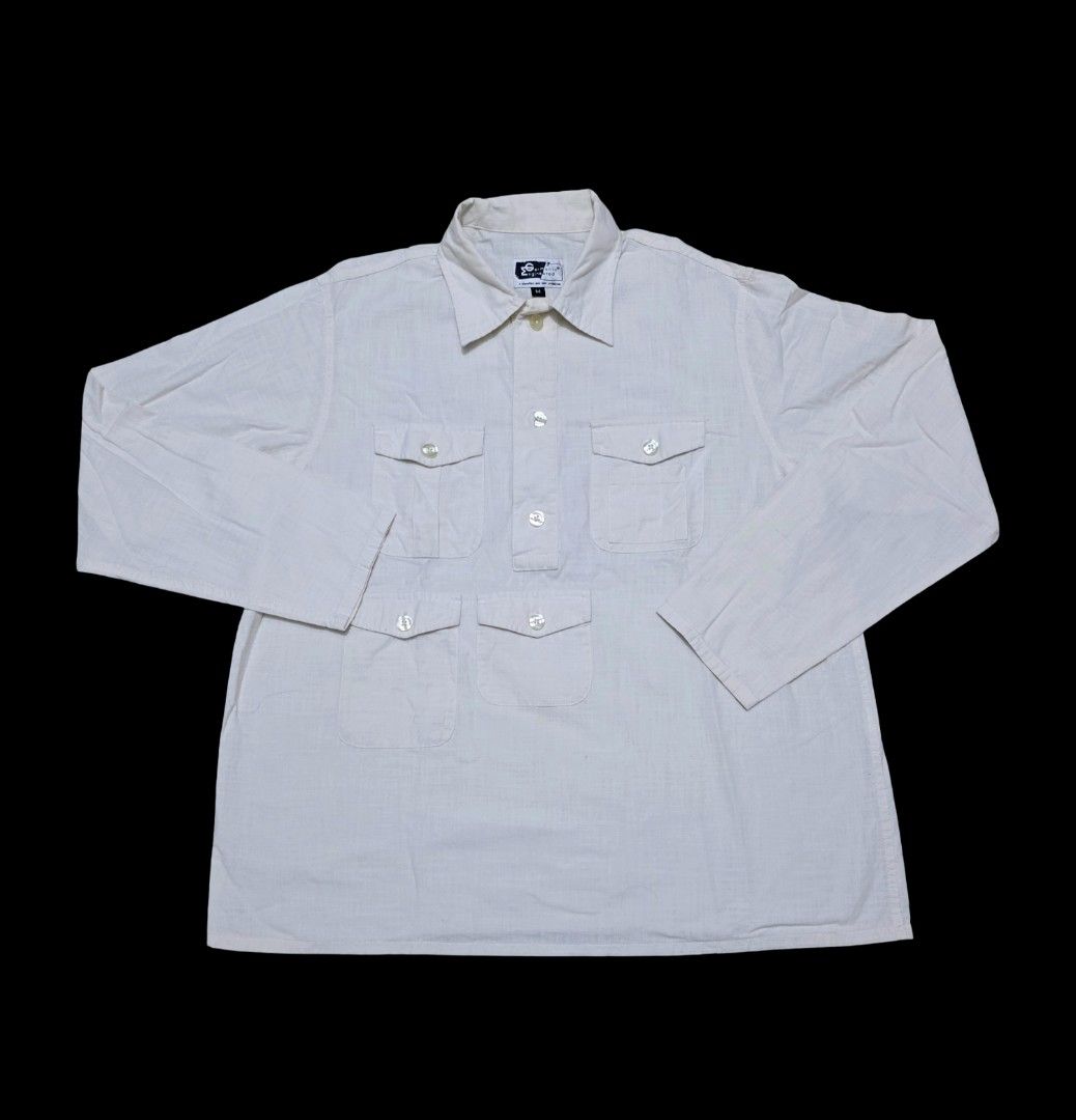 Engineered garments Multipocket LS shirt (Oatmeal/Ecru color) (Category: Tshirts & Polo Shirts ) located in Angeles City. Submitted by recyclecenter (Listing ID 1419946758, Image 1). Description: Engineered garments Multipocket LS shirt Size Medium Measurements Shoulder - 18.5 inches Width - 23.25 inches Below top collar to bottom - 27.5 inches In Ecru/Oatmeal color Multiple front flap pockets Probably an early iteration of the EG trail shirt or 