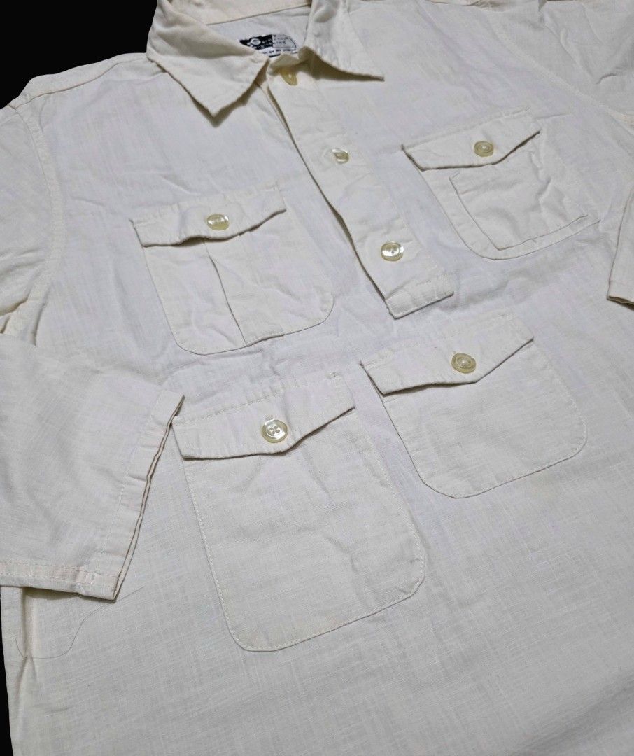 Engineered garments Multipocket LS shirt (Oatmeal/Ecru color) (Category: Tshirts & Polo Shirts ) located in Angeles City. Submitted by recyclecenter (Listing ID 1419946758, Image 2). Description: Engineered garments Multipocket LS shirt Size Medium Measurements Shoulder - 18.5 inches Width - 23.25 inches Below top collar to bottom - 27.5 inches In Ecru/Oatmeal color Multiple front flap pockets Probably an early iteration of the EG trail shirt or 