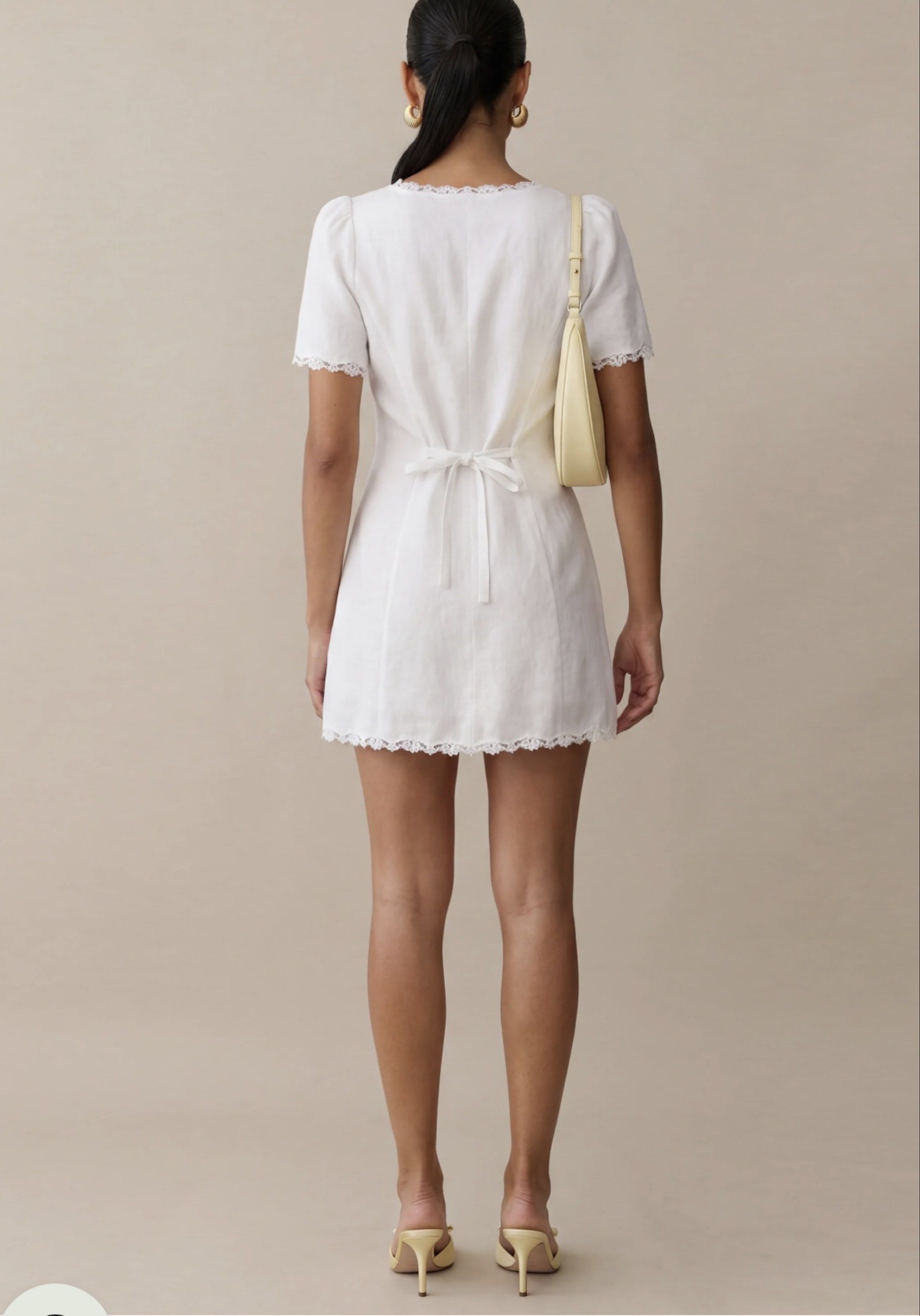 Few Moda Heidi Linen Dress (Category: Dresses) located in Davao. Submitted by quickootd (Listing ID 1419874301, Image 3). Description: - Few Moda white linen mini dress can fit xs-s - Square neckline with lace trim - Button-down front - Short sleeves - Fitted silhouette - Back tie detail - Mini length with lace trim at hem - Similar manufacturer as Jenni Kayne bought from us.